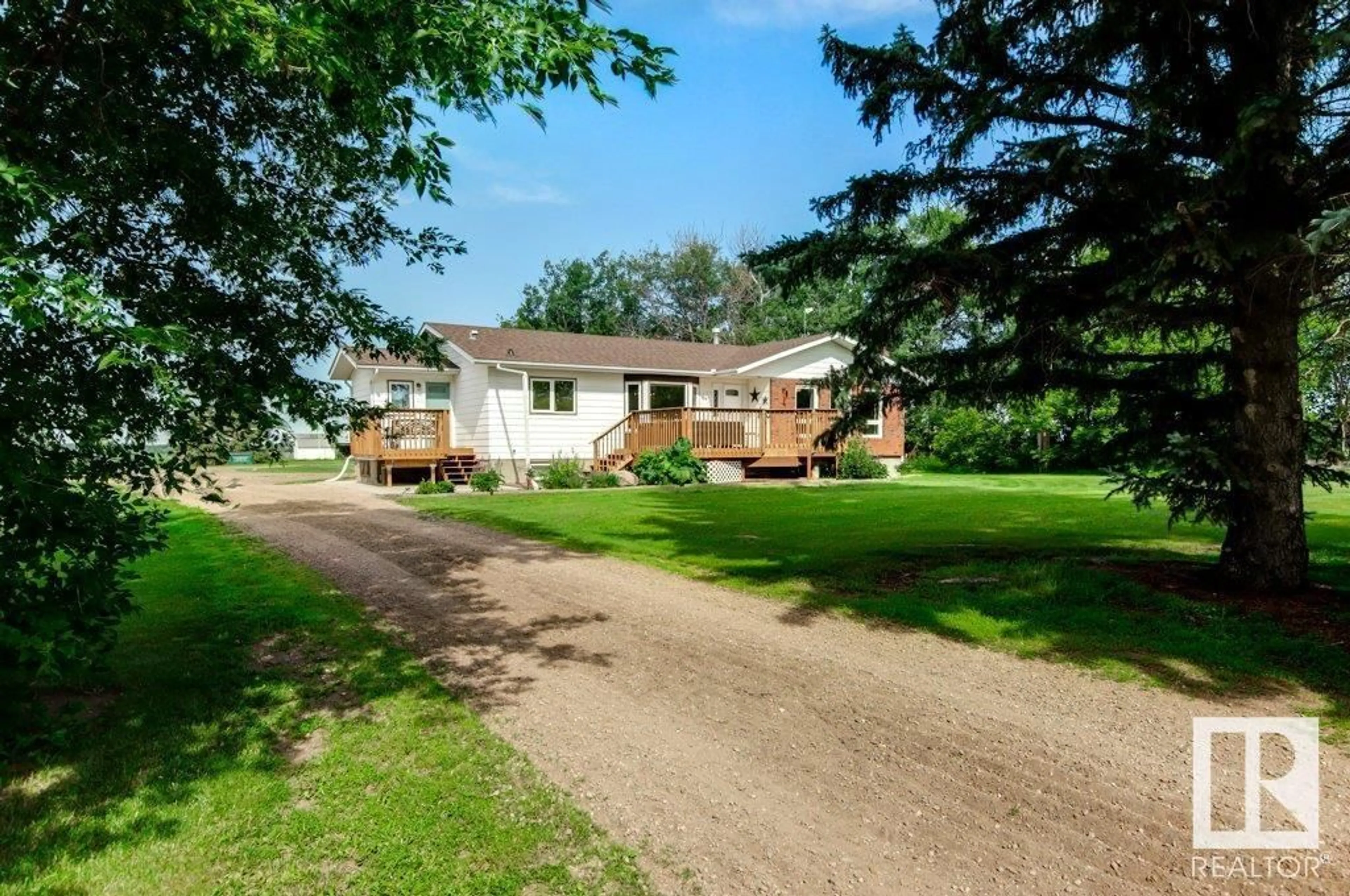 A pic from outside/outdoor area/front of a property/back of a property/a pic from drone, street for 230 - 61106 RNAGE ROAD, Rural Thorhild County Alberta T0A3J0