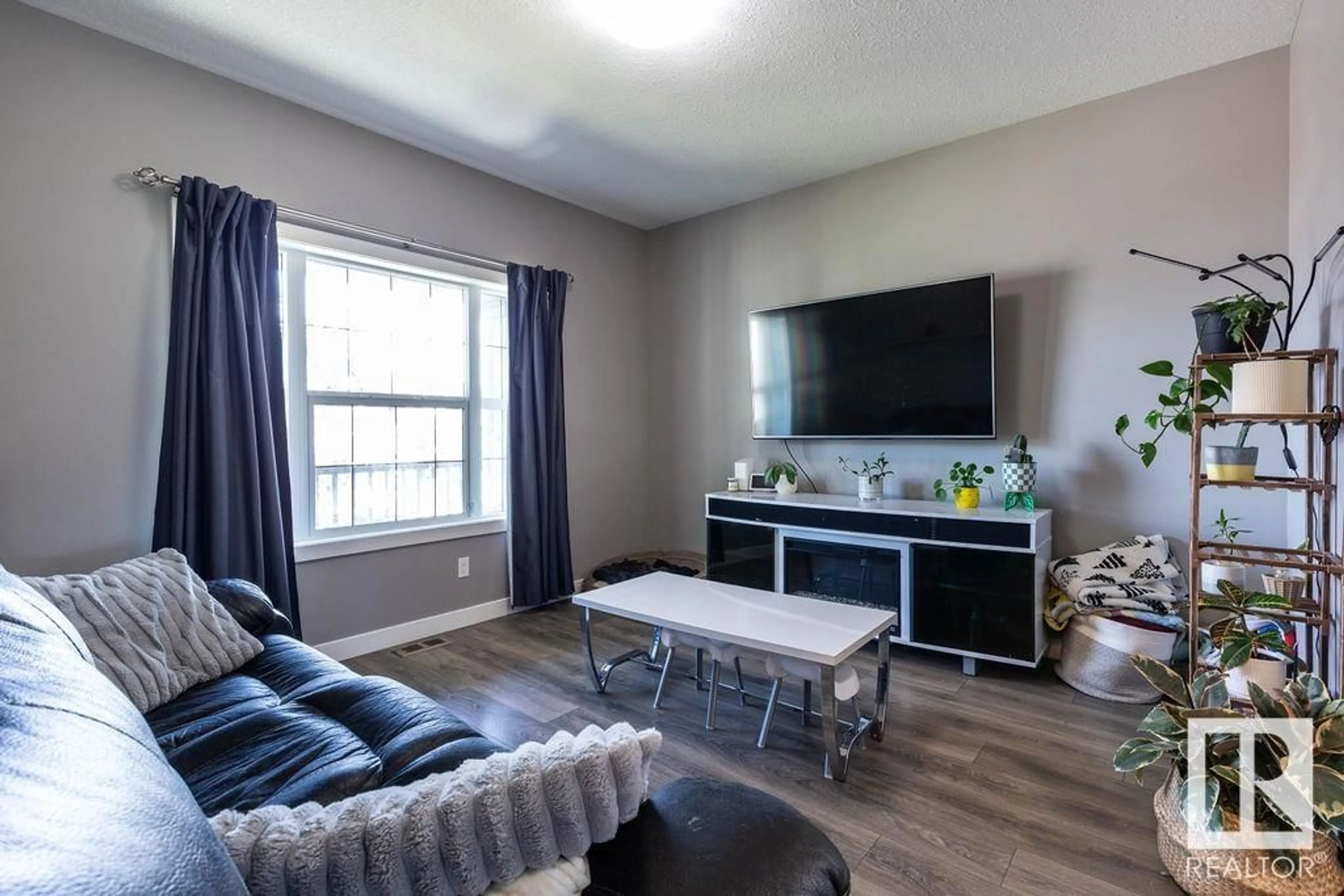 Living room with furniture, unknown for 17804 59 ST, Edmonton Alberta T5Y0W8