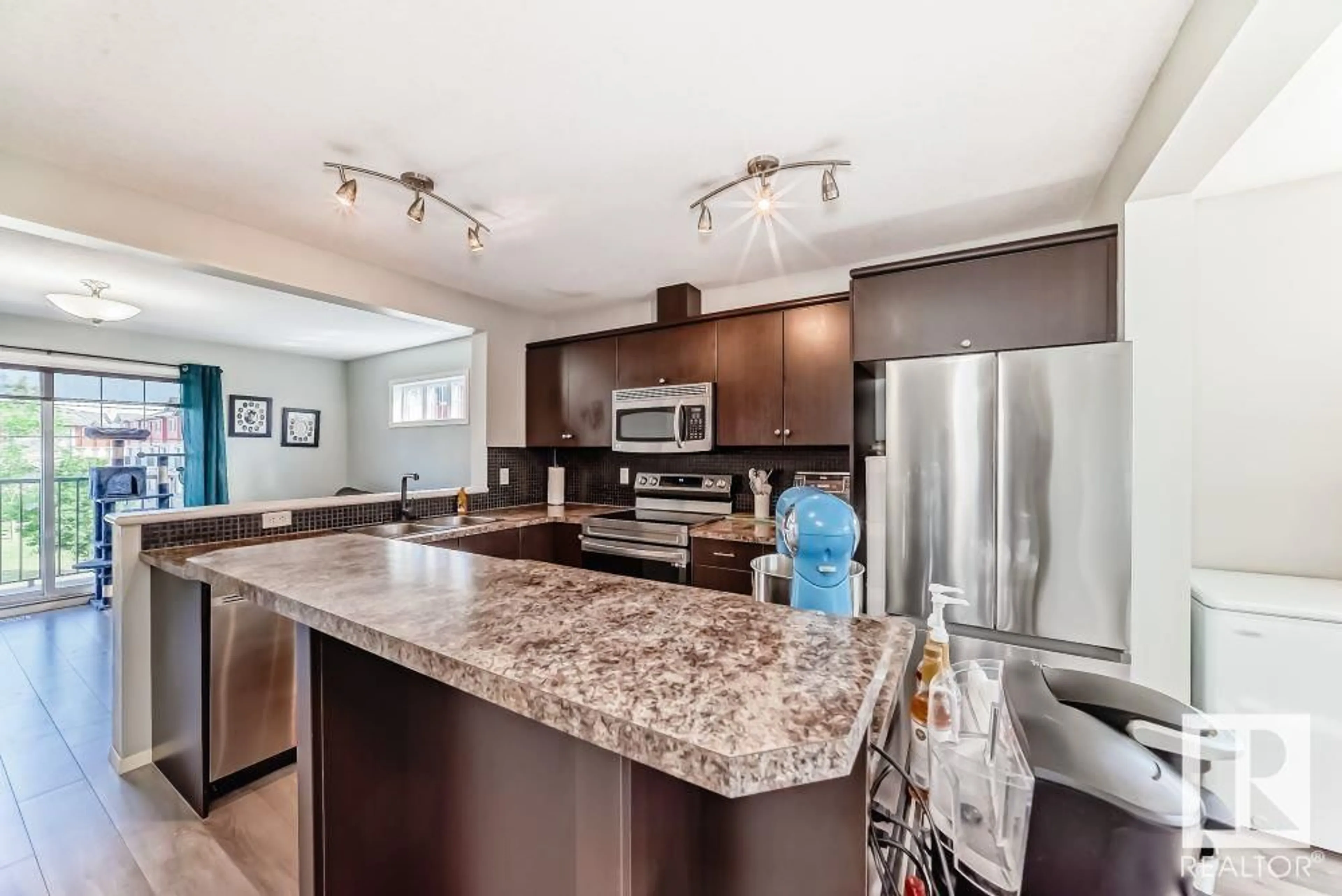 Open concept kitchen, unknown for #22 - 3751 12 ST, Edmonton Alberta T6T0N3