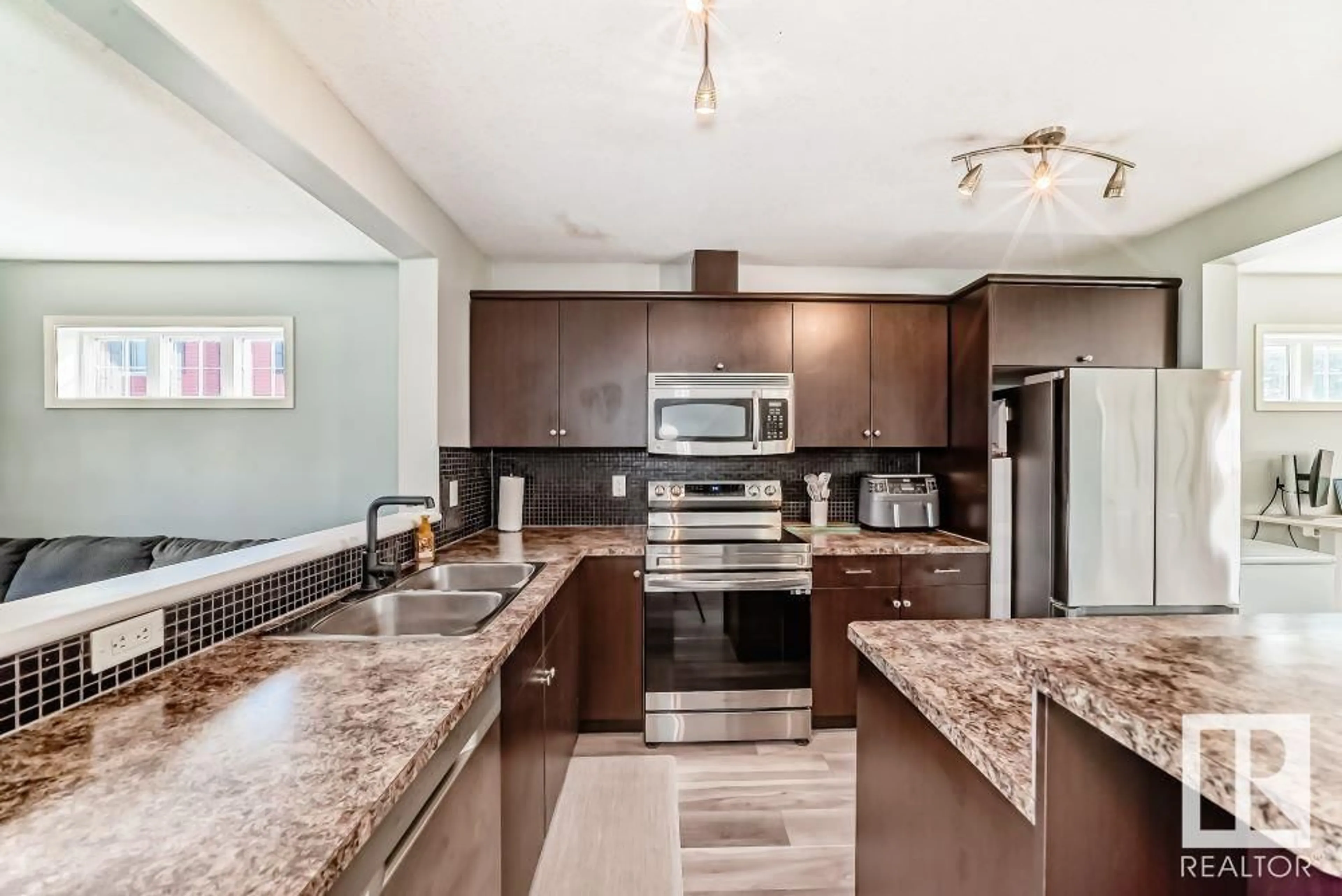 Open concept kitchen, ceramic/tile floor for #22 - 3751 12 ST, Edmonton Alberta T6T0N3