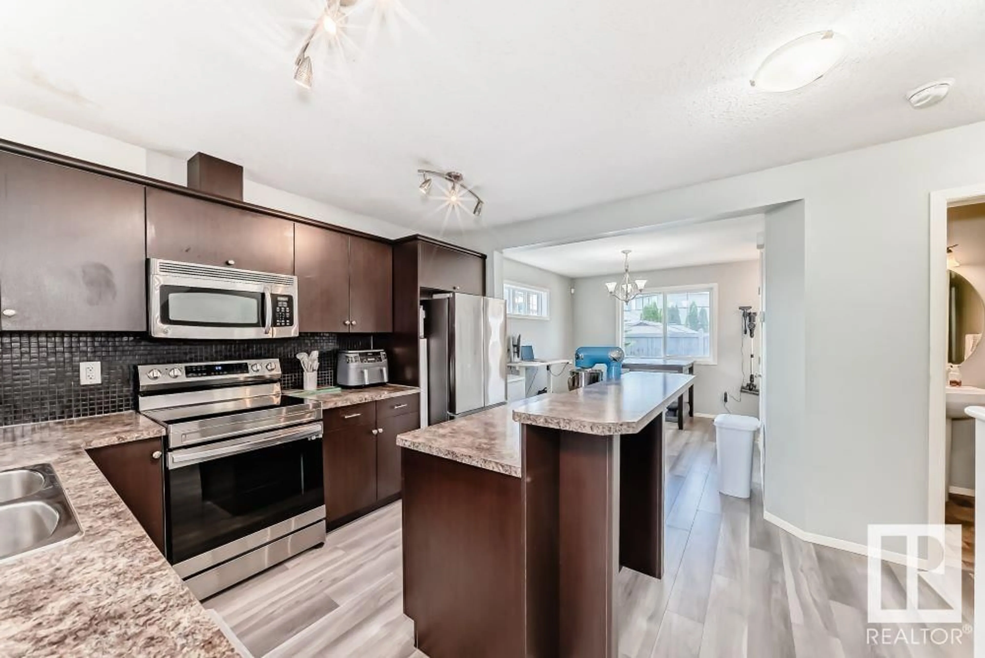 Open concept kitchen, unknown for #22 - 3751 12 ST, Edmonton Alberta T6T0N3