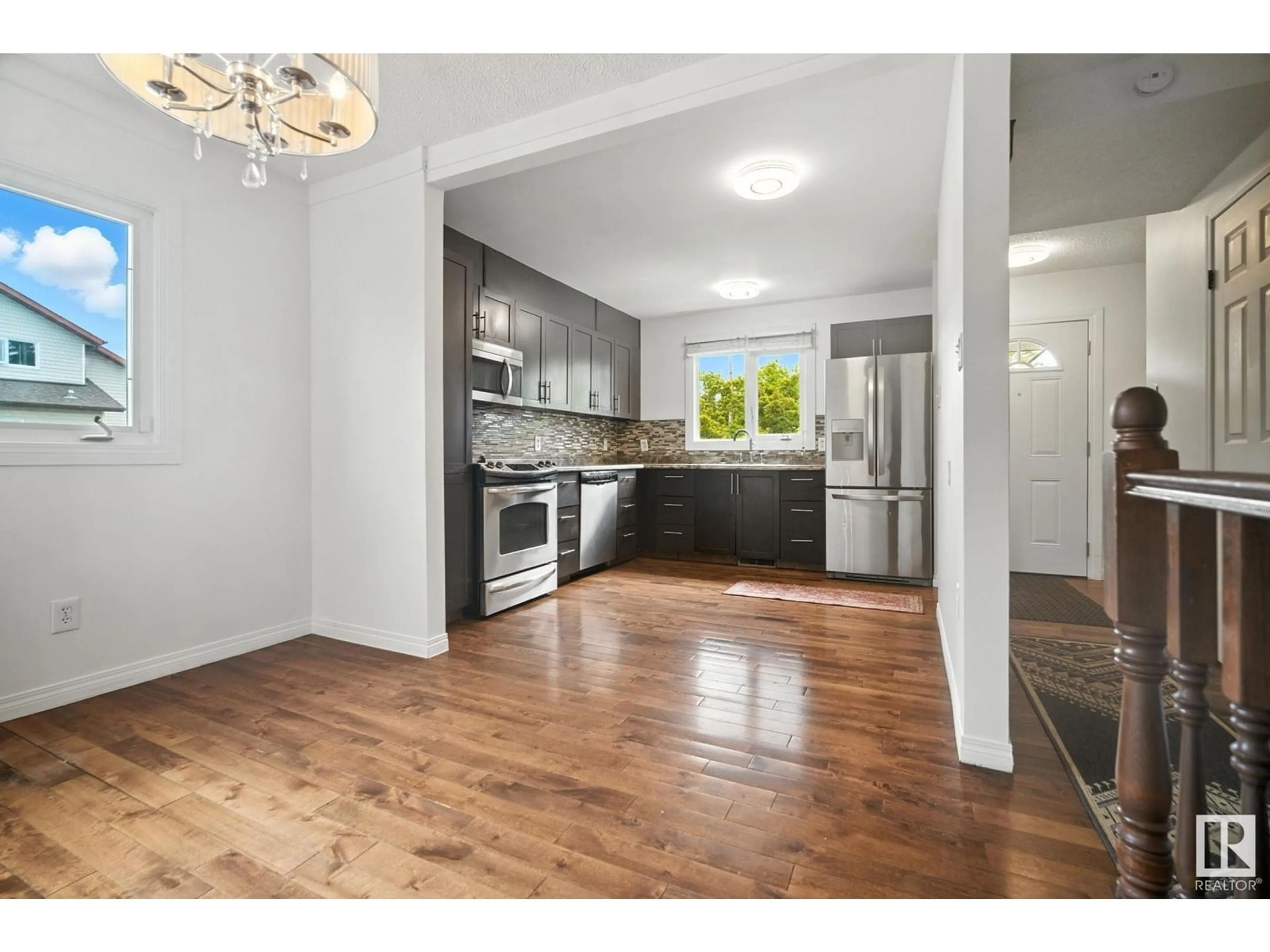 Open concept kitchen, unknown for NW - 9541 A 180 ST, Edmonton Alberta T5T2Z4