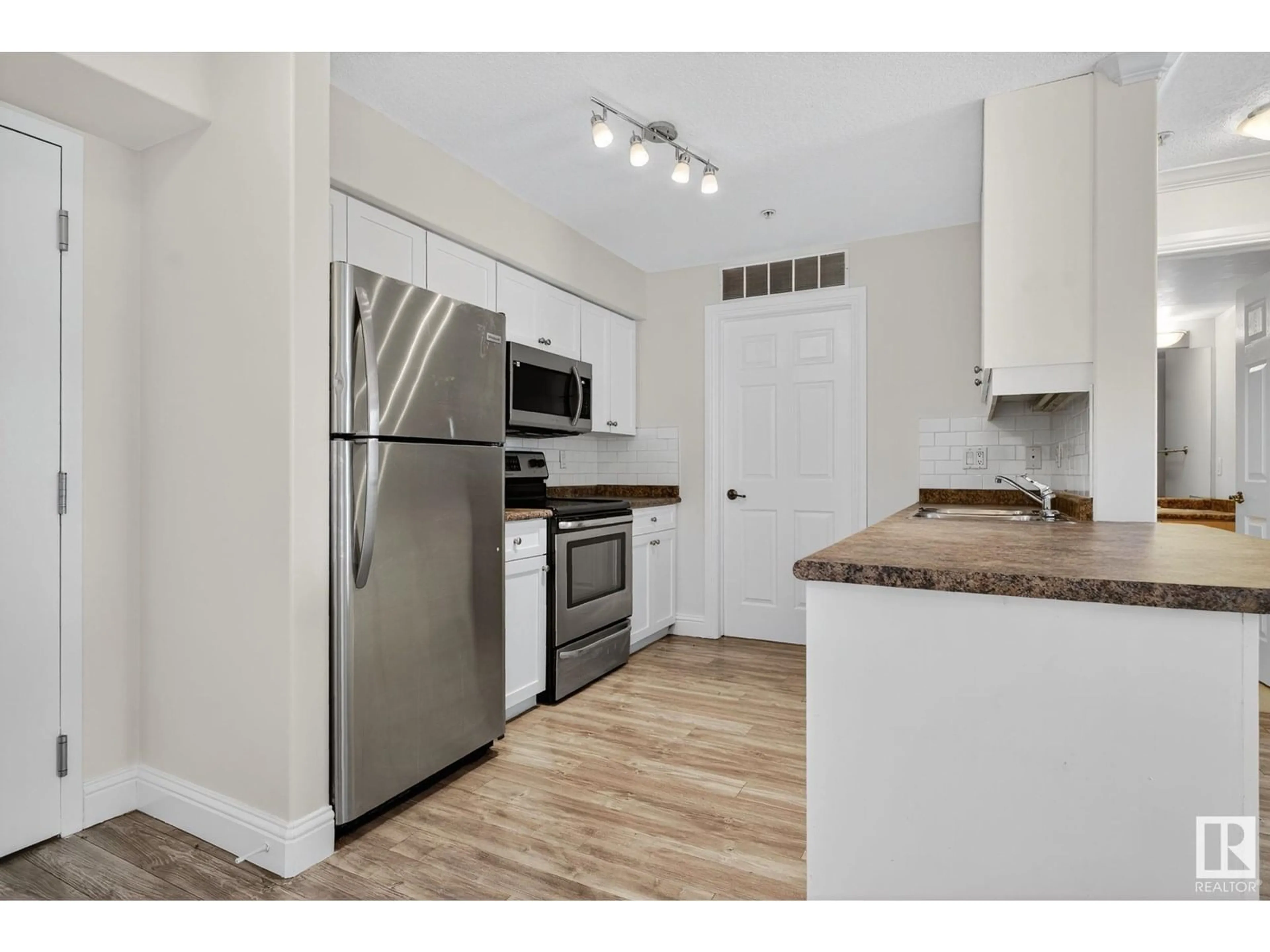 Standard kitchen, wood/laminate floor for 310 - 13111 140 AV, Edmonton Alberta T6V0B1