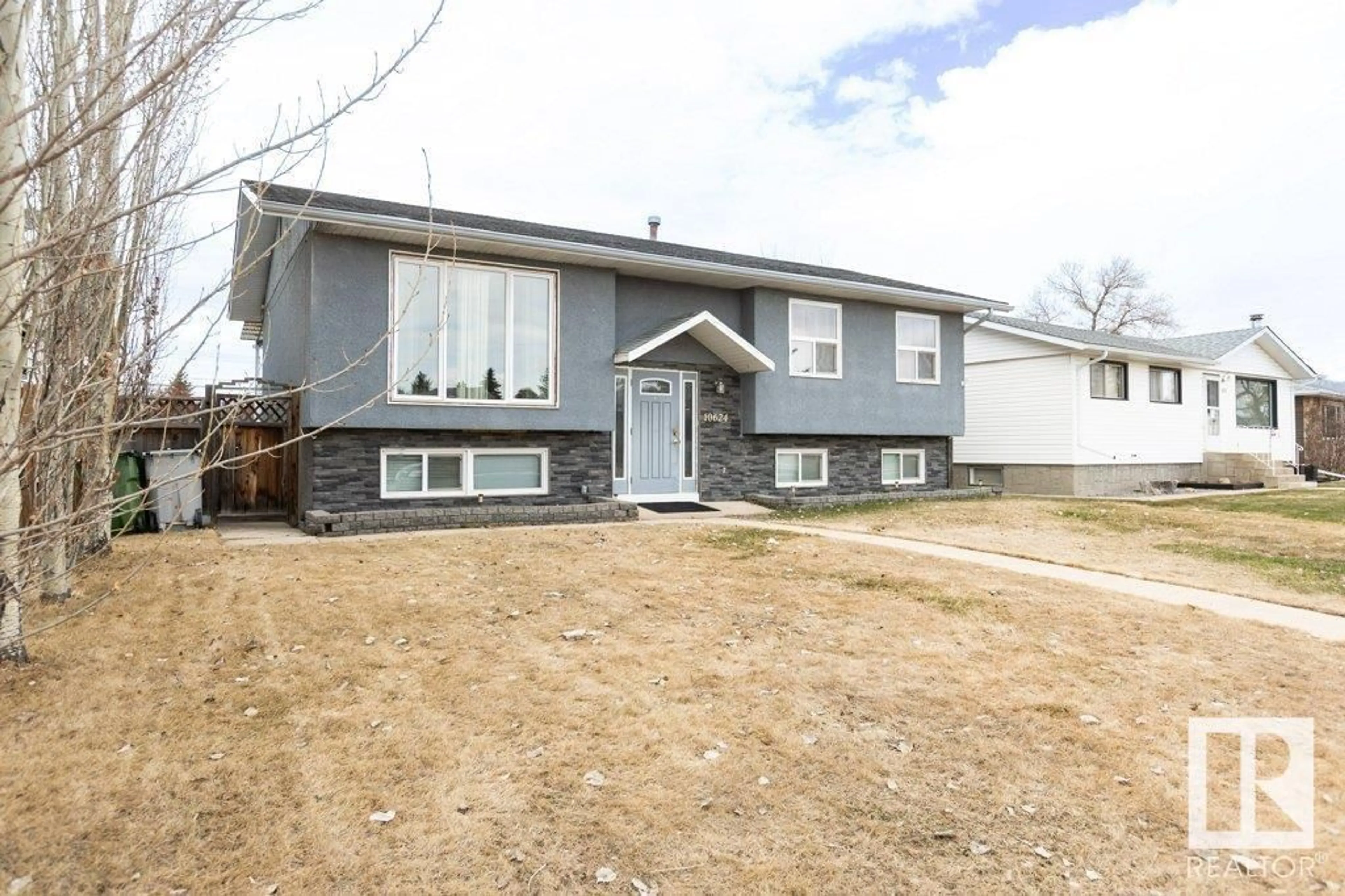 Home with vinyl exterior material, street for 10624 104 ST, Westlock Alberta T7P2P6