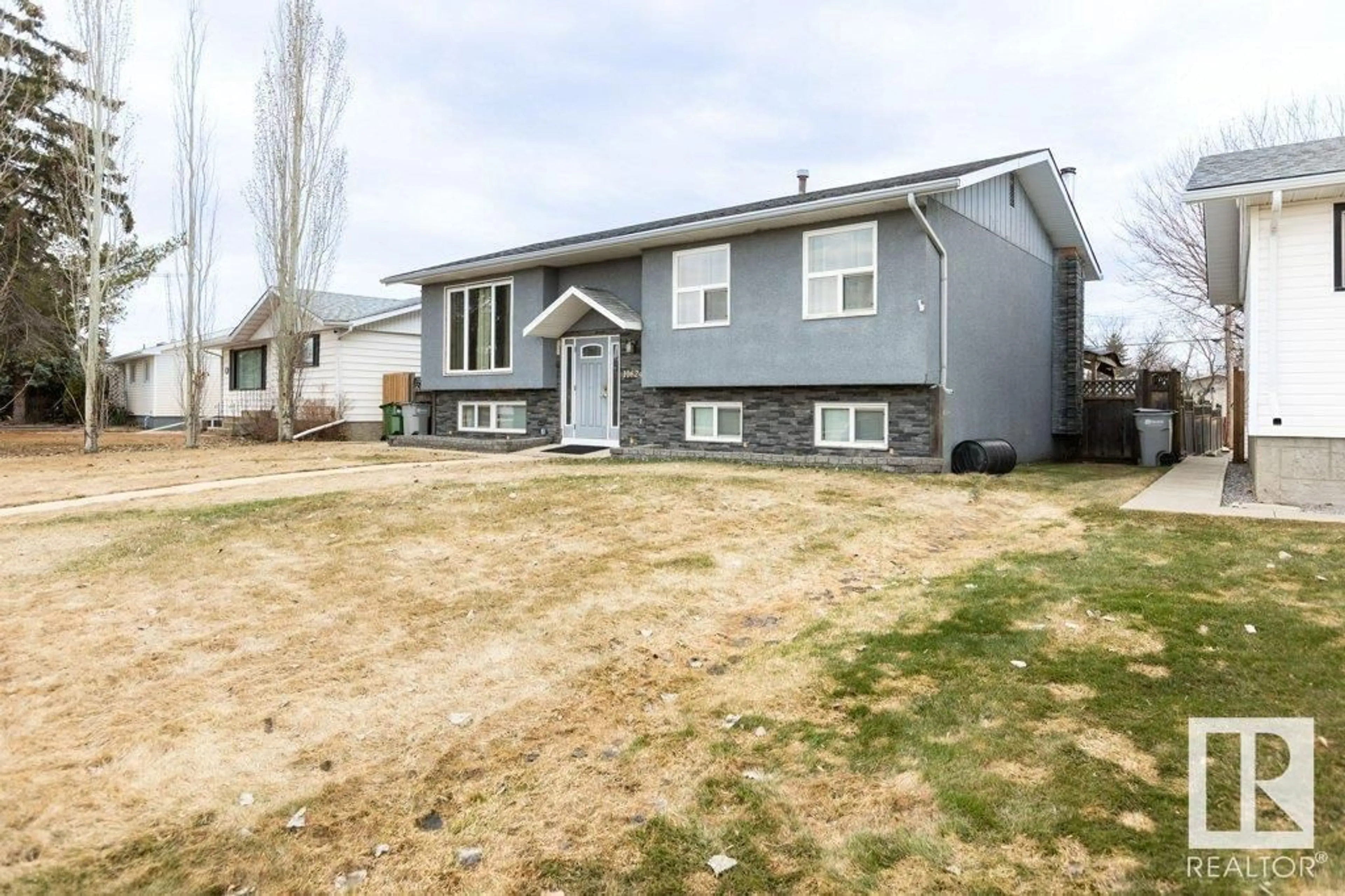 Home with vinyl exterior material, street for 10624 104 ST, Westlock Alberta T7P2P6