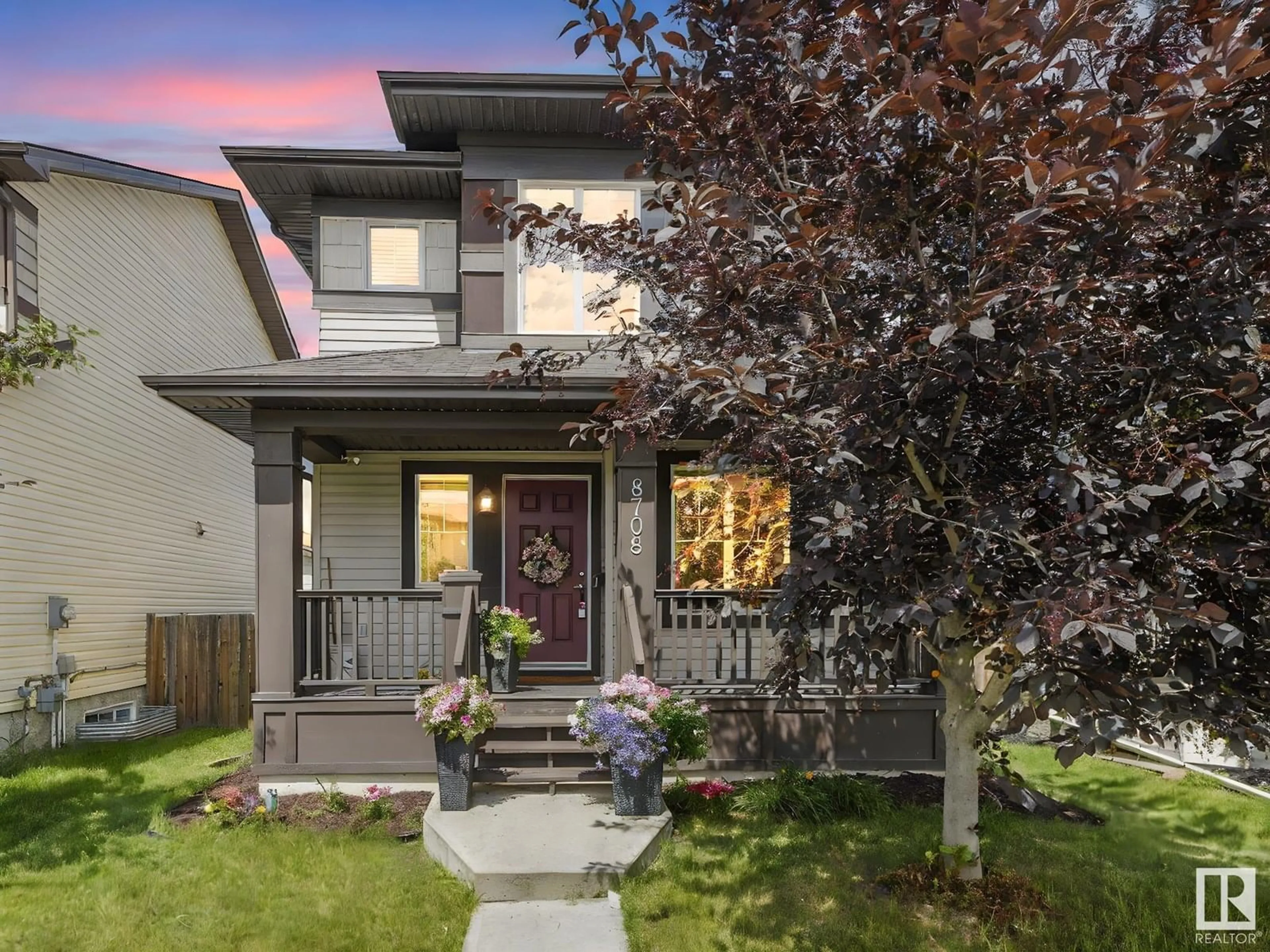 Home with vinyl exterior material, street for 8708 180 AV, Edmonton Alberta T5Z0E3