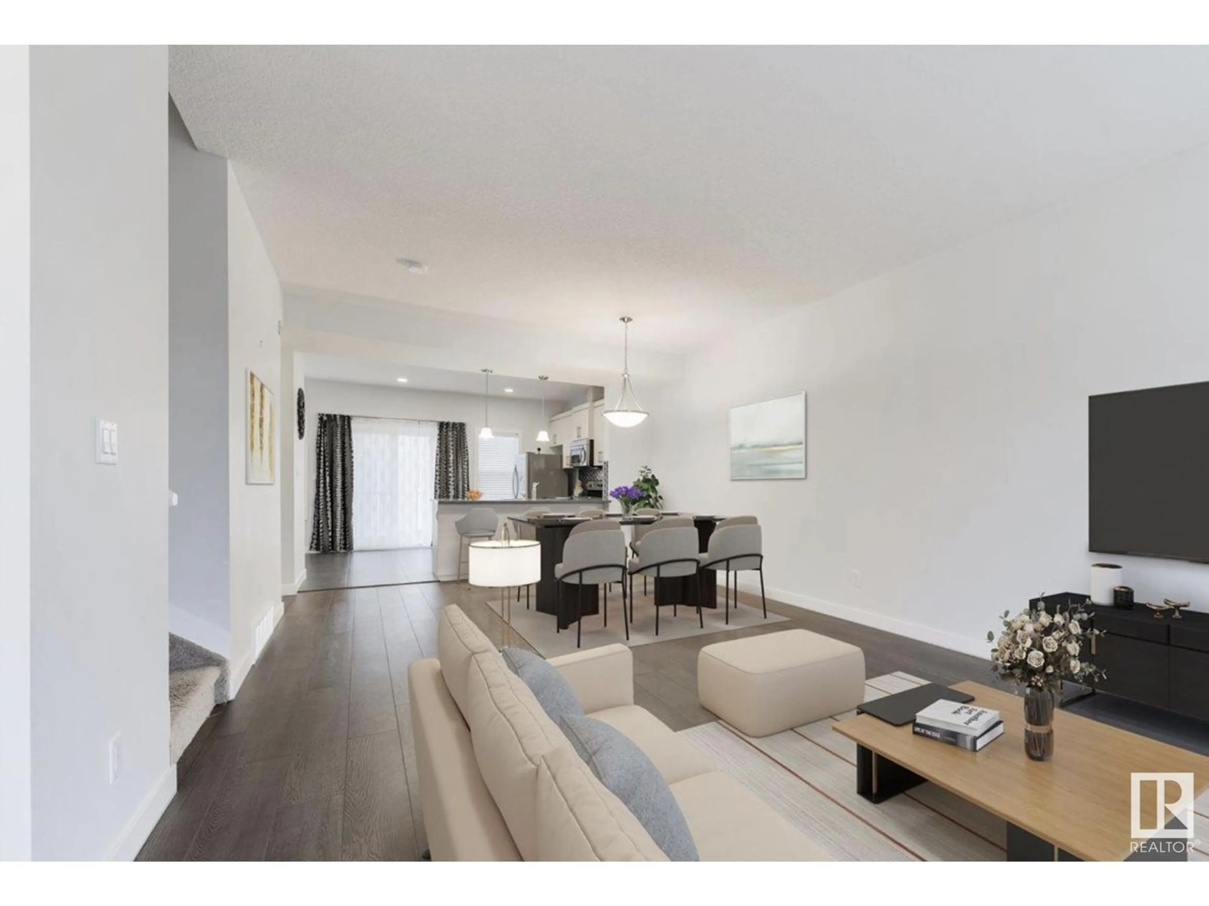 Living room with furniture, wood/laminate floor for 723 - 35 172 ST, Edmonton Alberta T6W2N6