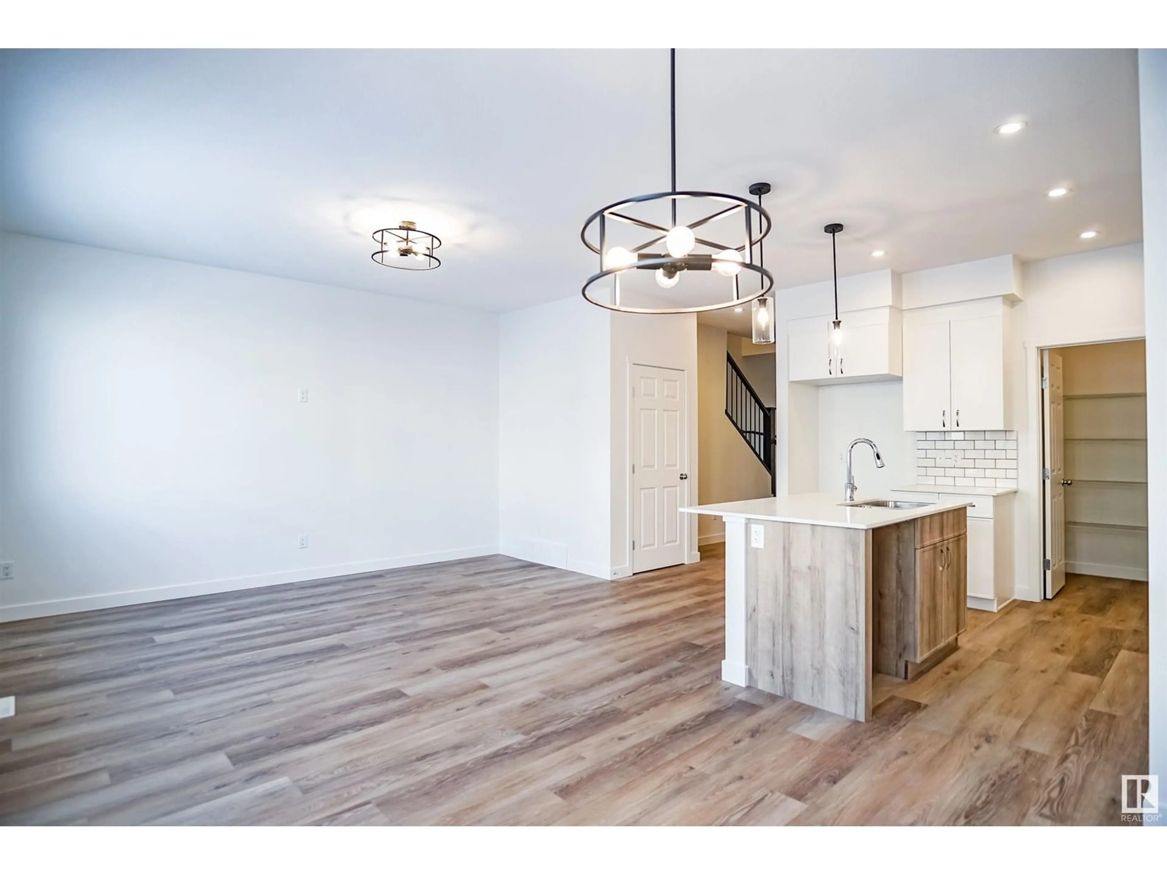 Open concept kitchen, unknown for 1027 14 AV, Edmonton Alberta T6T2N5