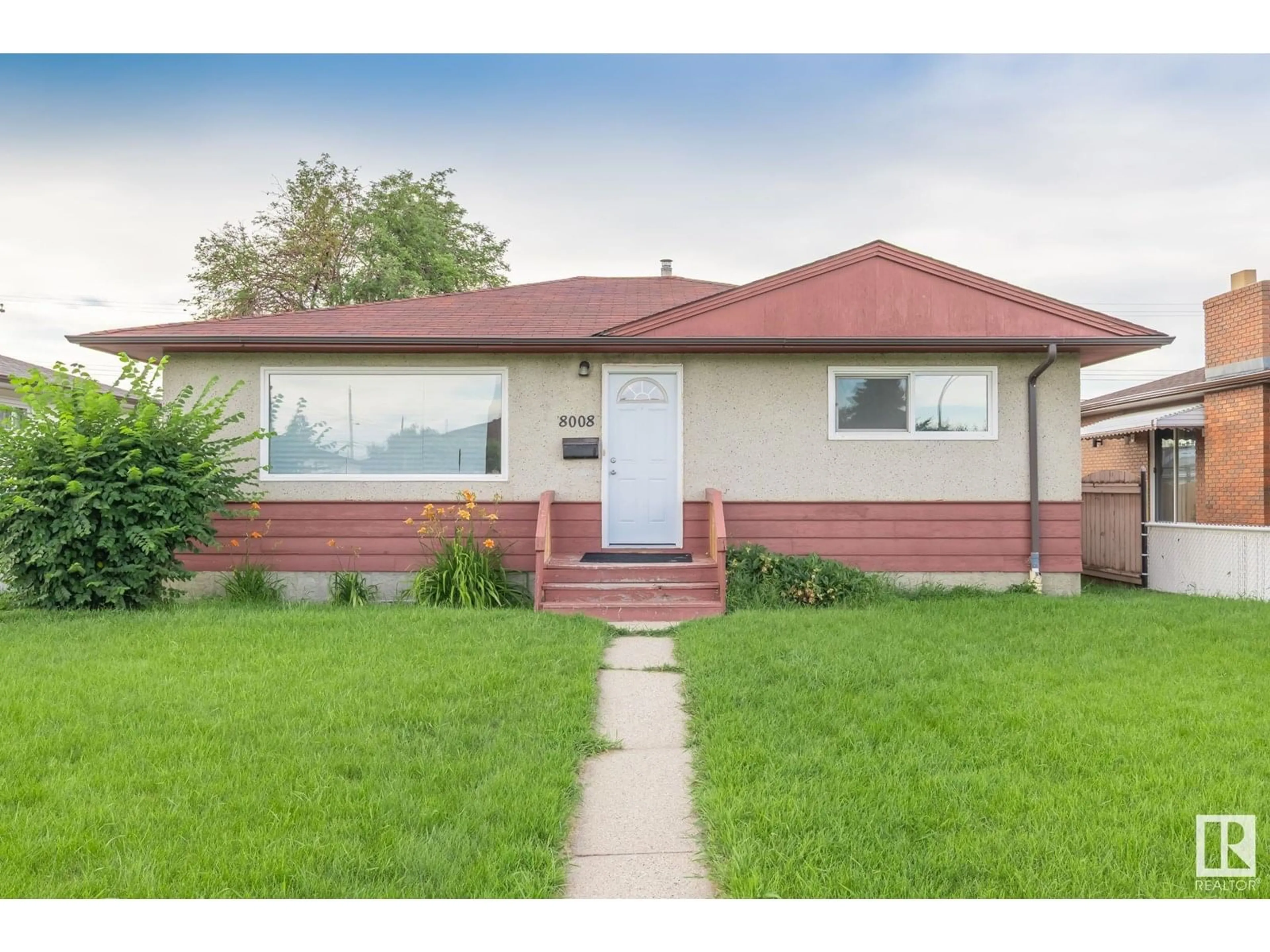 Home with vinyl exterior material, street for 8008 129A AV, Edmonton Alberta T5C1X2