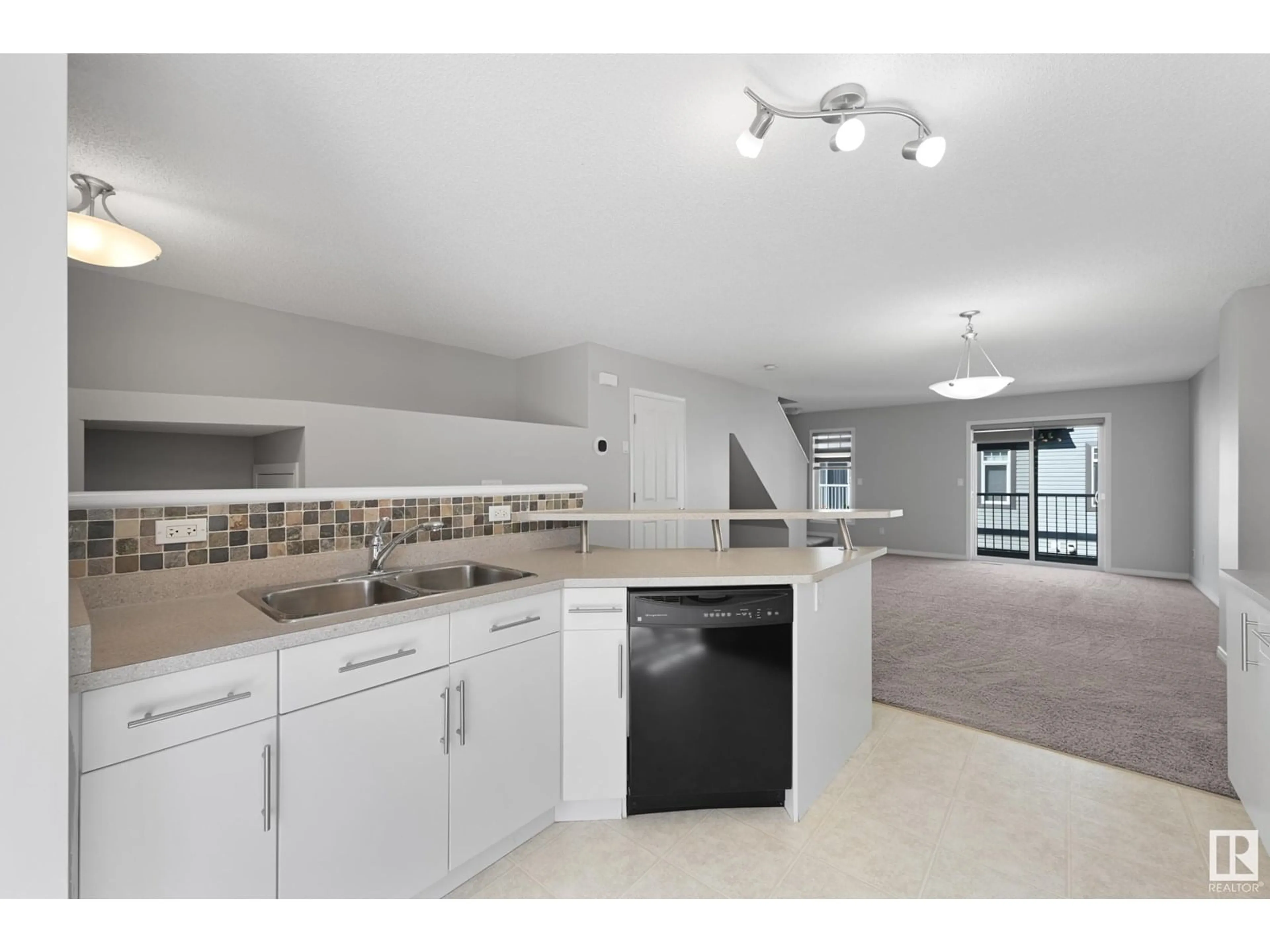 Open concept kitchen, ceramic/tile floor for 465 - 133 HEMINGWAY RD, Edmonton Alberta T6M0J7