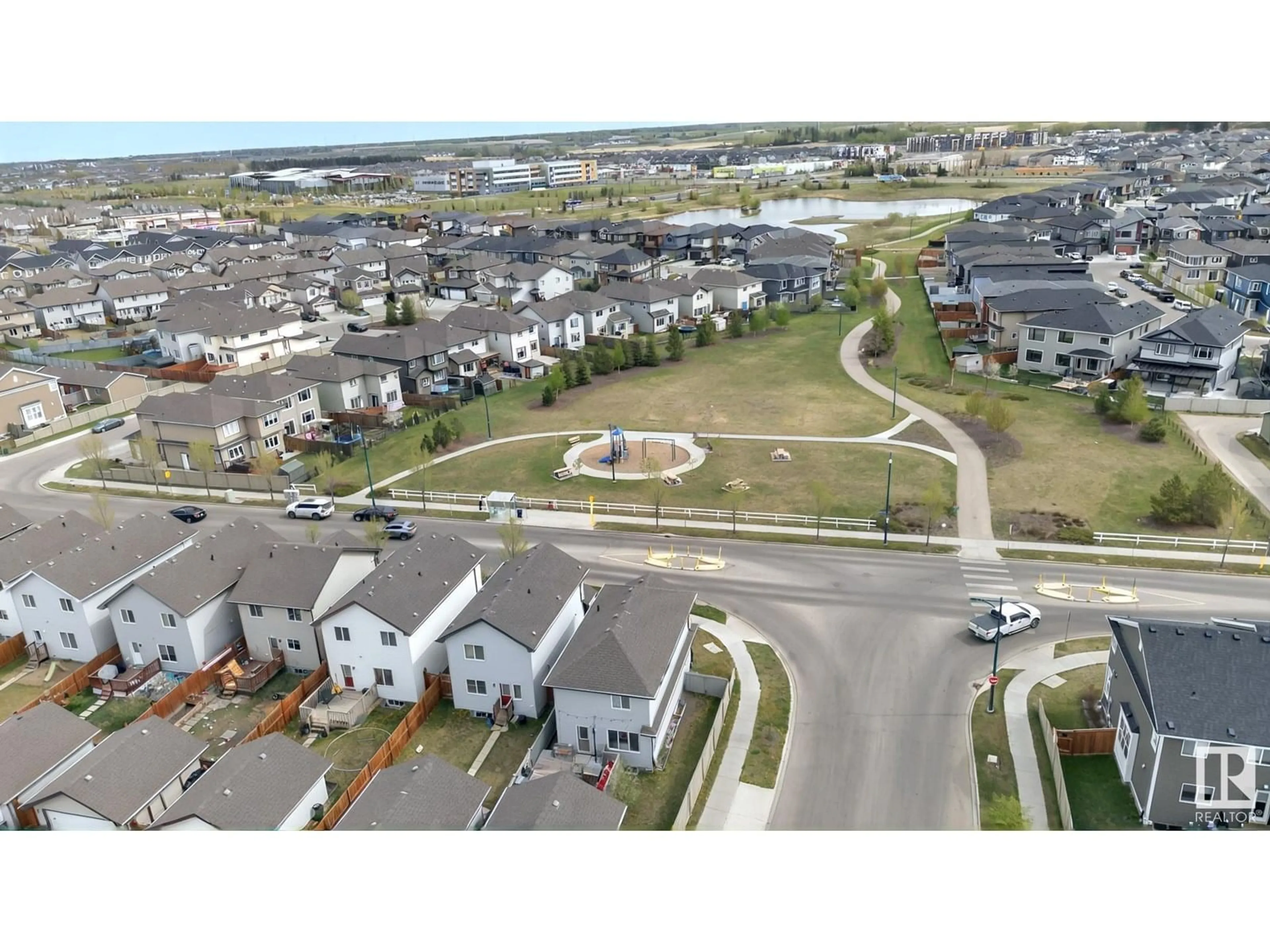 A pic from outside/outdoor area/front of a property/back of a property/a pic from drone, street for 2004 24 ST, Edmonton Alberta T6T0Y8