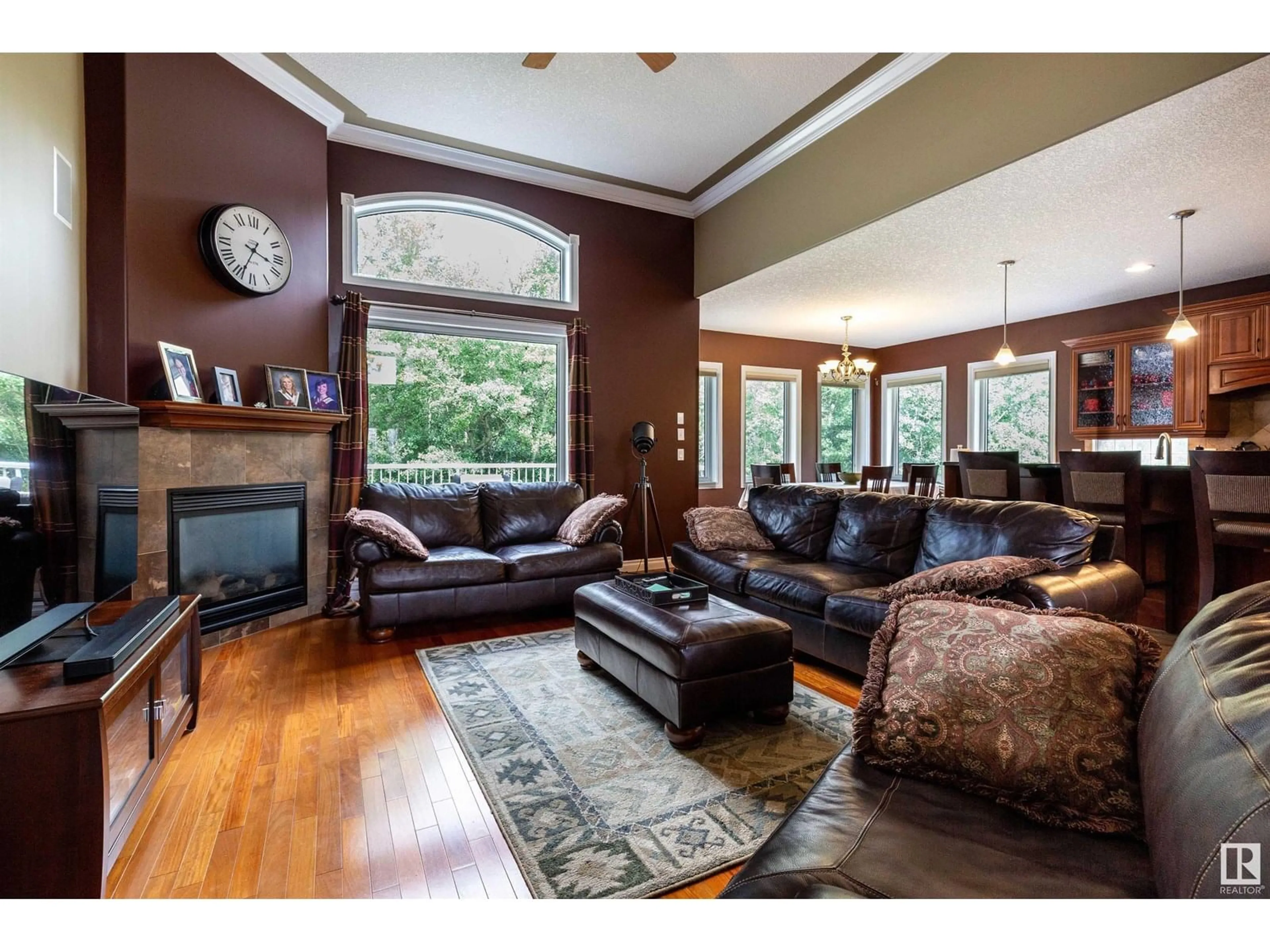 Living room with furniture, wood/laminate floor for #194 - 52422 RGE ROAD 224, Rural Strathcona County Alberta T8A6N1