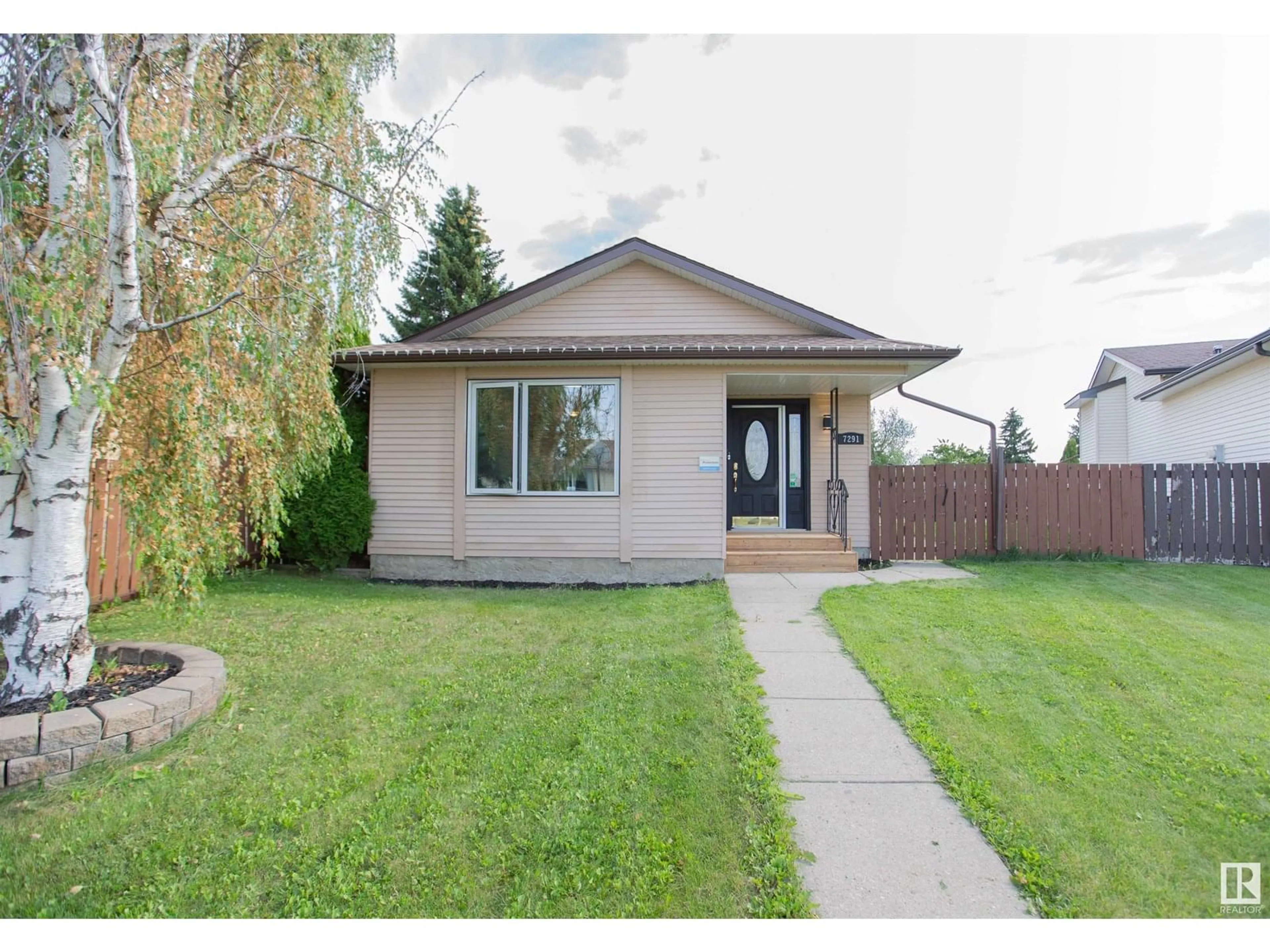 Home with vinyl exterior material, street for 7291 152B AV, Edmonton Alberta T5C3P9