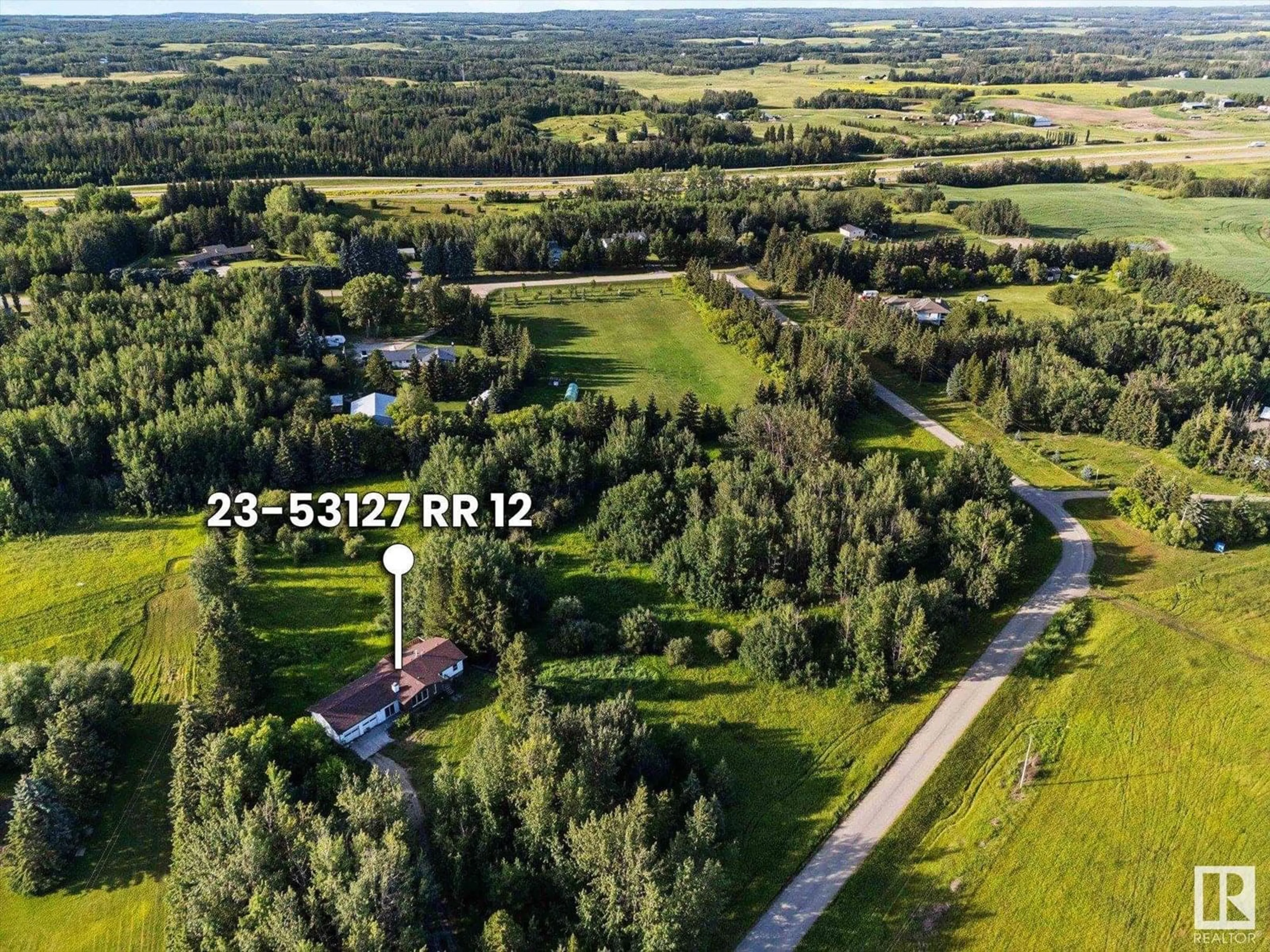 A pic from outside/outdoor area/front of a property/back of a property/a pic from drone, street for 53127 - 23 RANGE ROAD 12, Rural Parkland County Alberta T7Y2T1