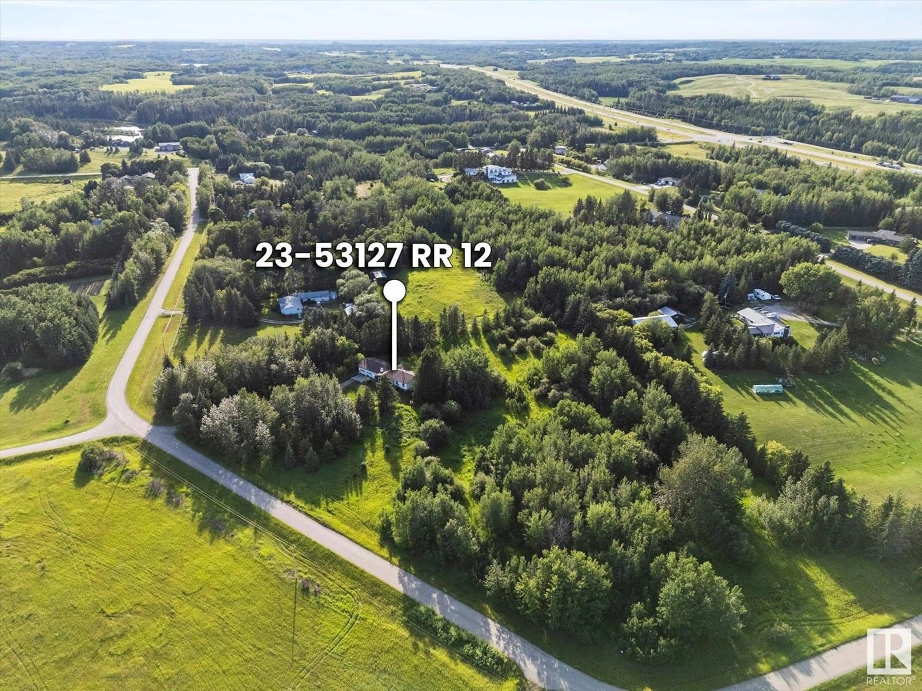 A pic from outside/outdoor area/front of a property/back of a property/a pic from drone, forest/trees view for 53127 - 23 RANGE ROAD 12, Rural Parkland County Alberta T7Y2T1