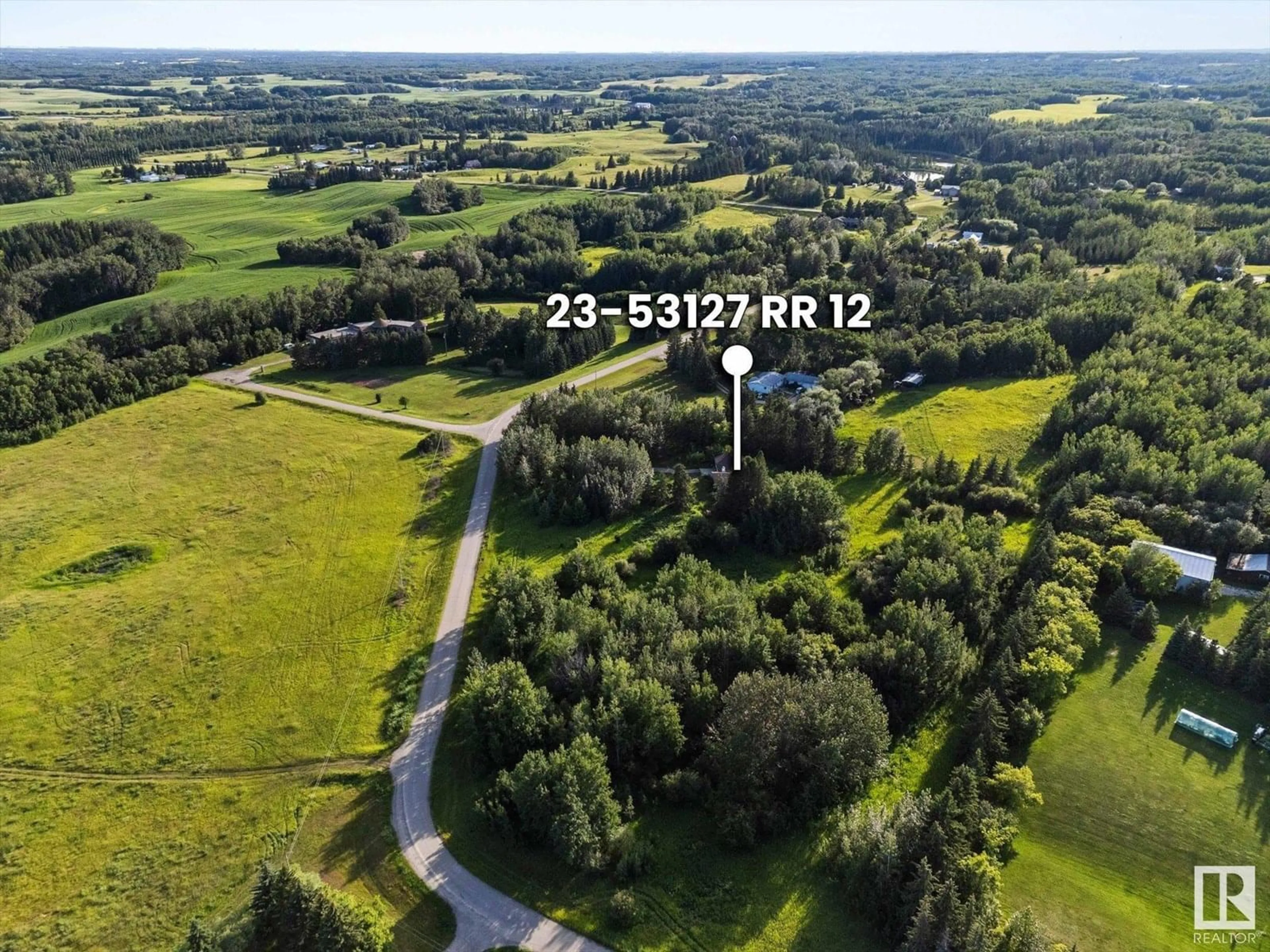 A pic from outside/outdoor area/front of a property/back of a property/a pic from drone, forest/trees view for 53127 - 23 RANGE ROAD 12, Rural Parkland County Alberta T7Y2T1