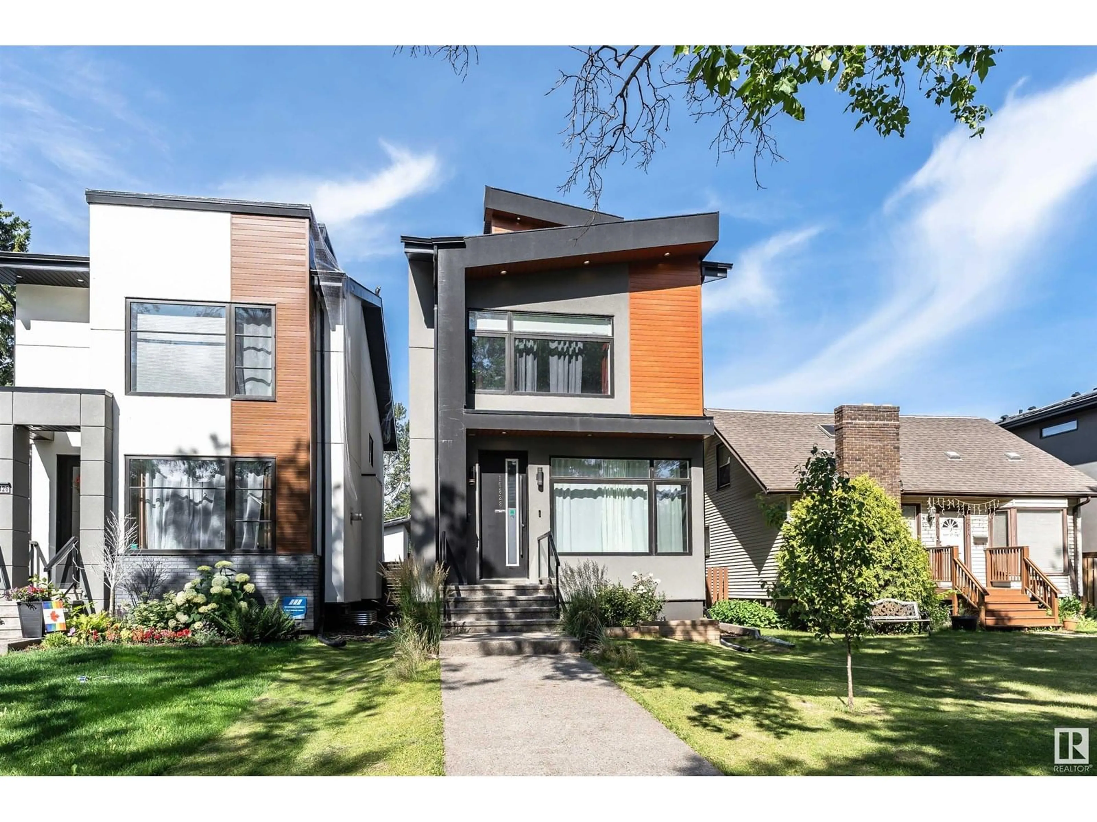 Home with brick exterior material, street for 10828 129 ST, Edmonton Alberta T5M0X7