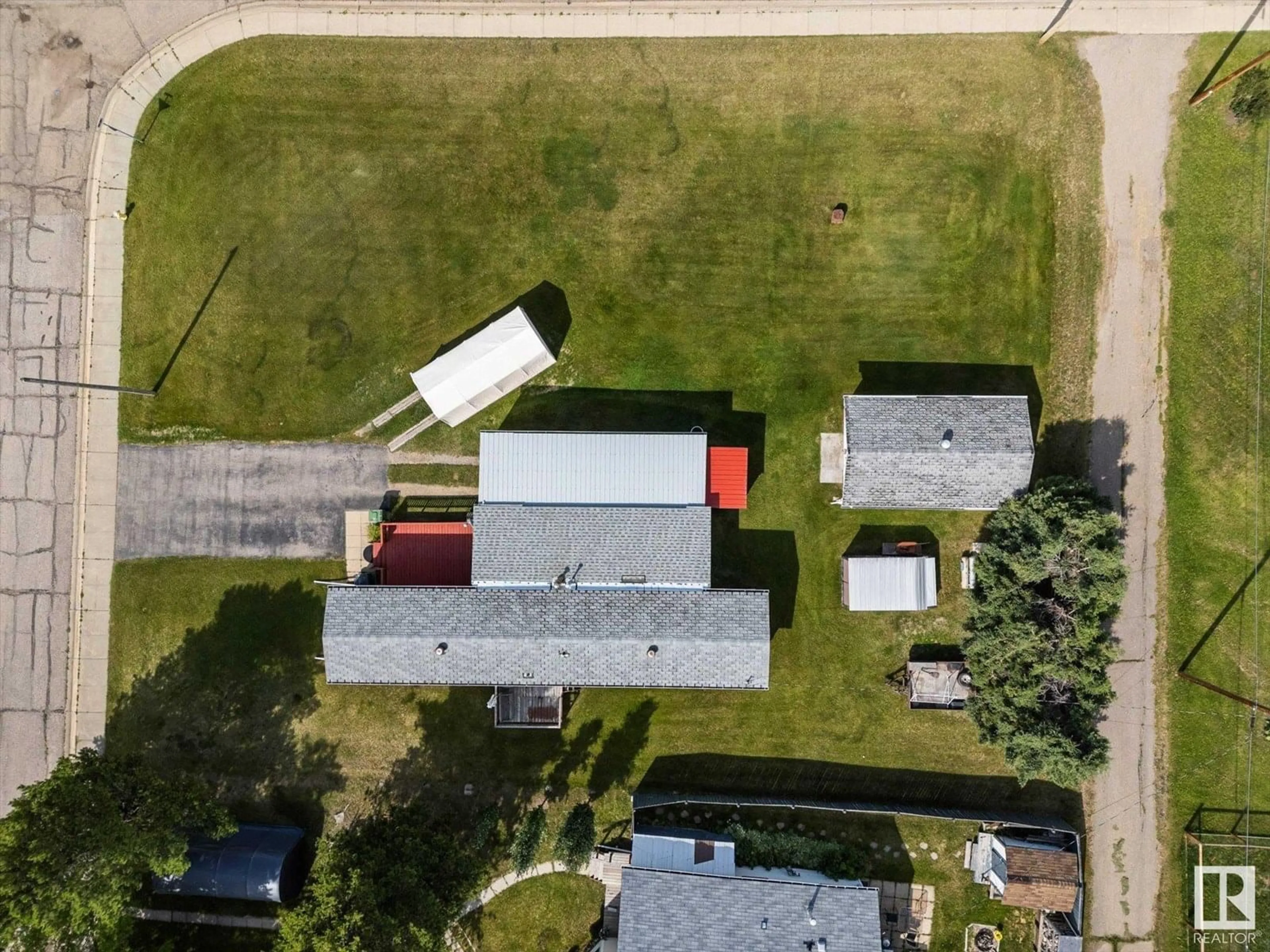 A pic from outside/outdoor area/front of a property/back of a property/a pic from drone, street for 5240 53 AV, Wabamun Alberta T0E2K0