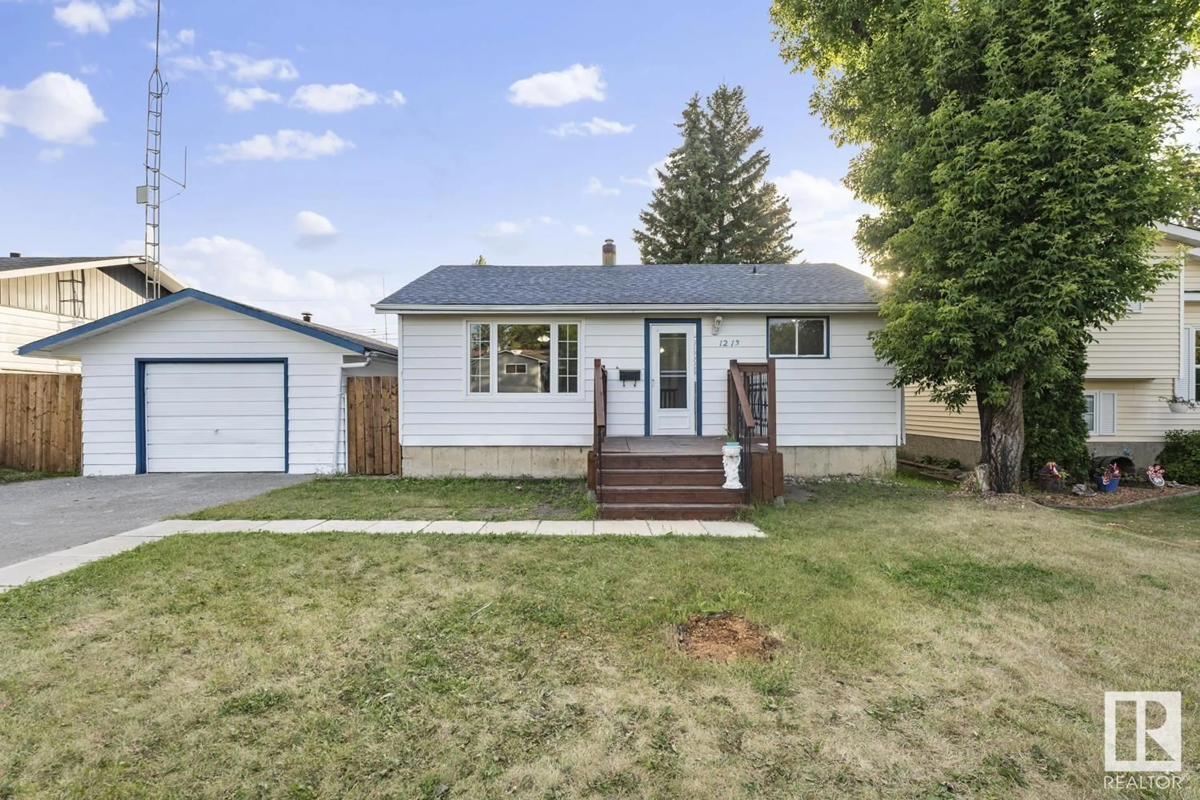 Home with vinyl exterior material, street for 1213 10 ST, Cold Lake Alberta T9M1J6