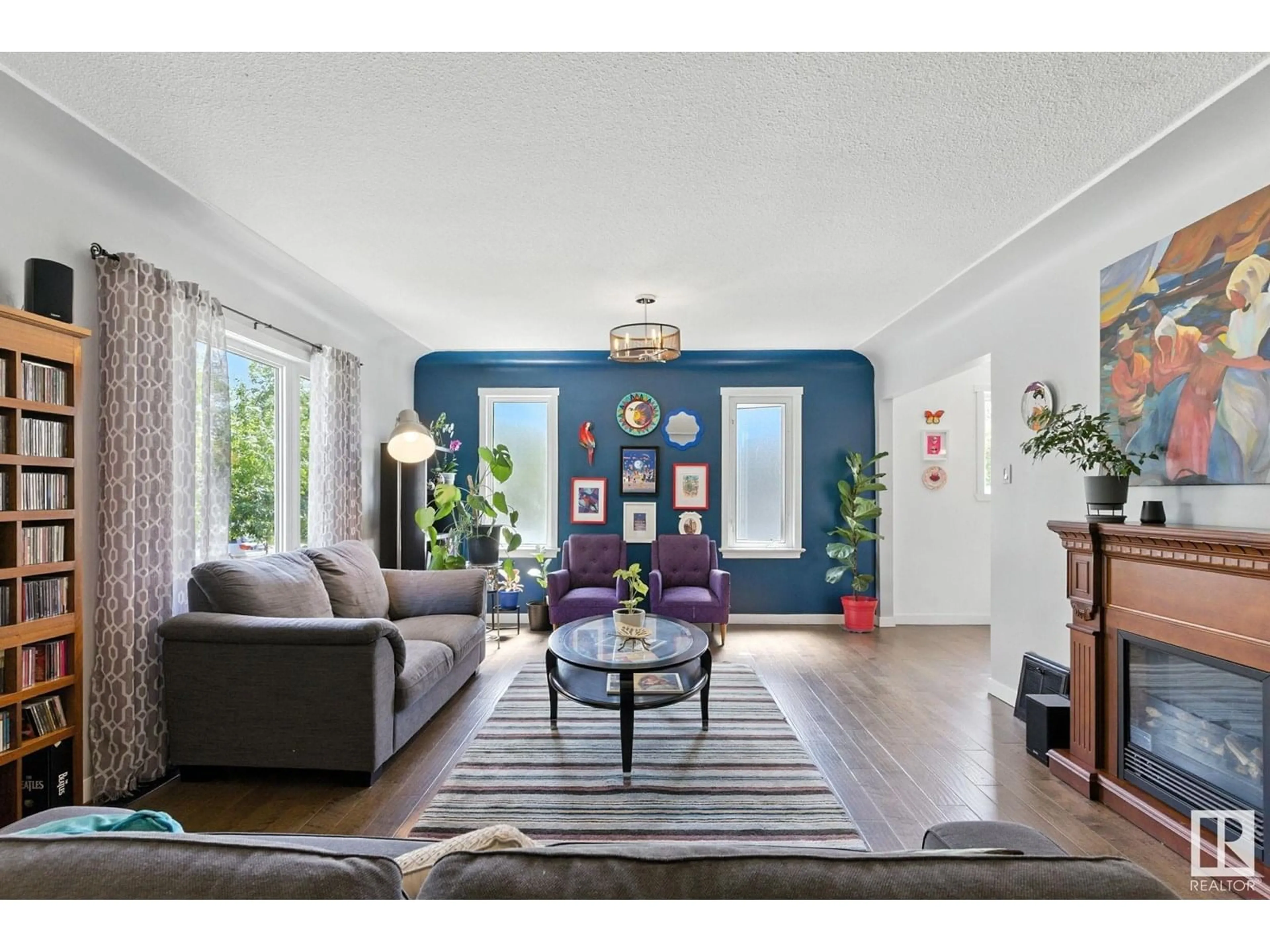 Living room with furniture, unknown for NW - 11204 61 ST, Edmonton Alberta T5W4A5