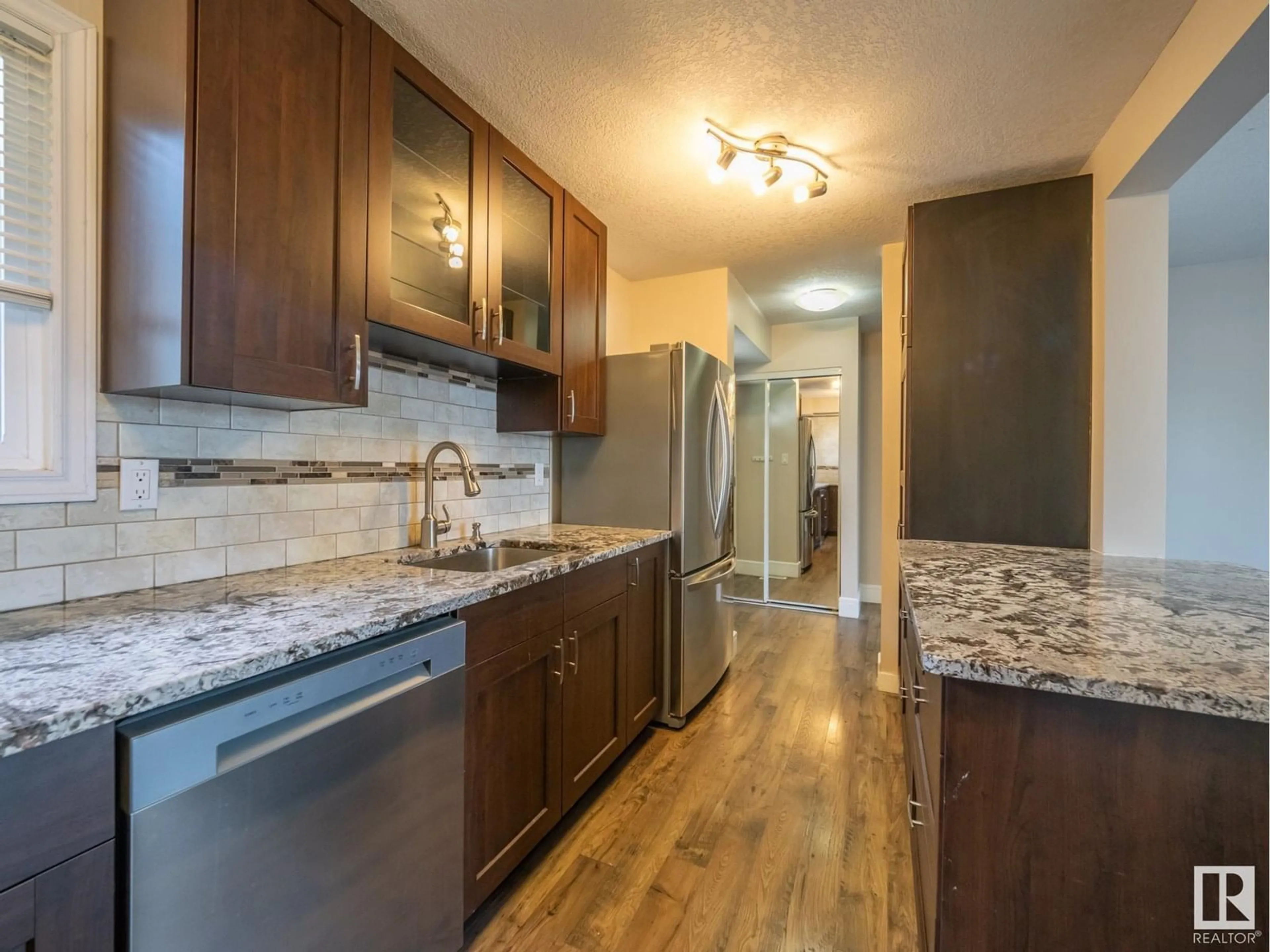 Open concept kitchen, unknown for NW - 18422 62B AV, Edmonton Alberta T5T2N7