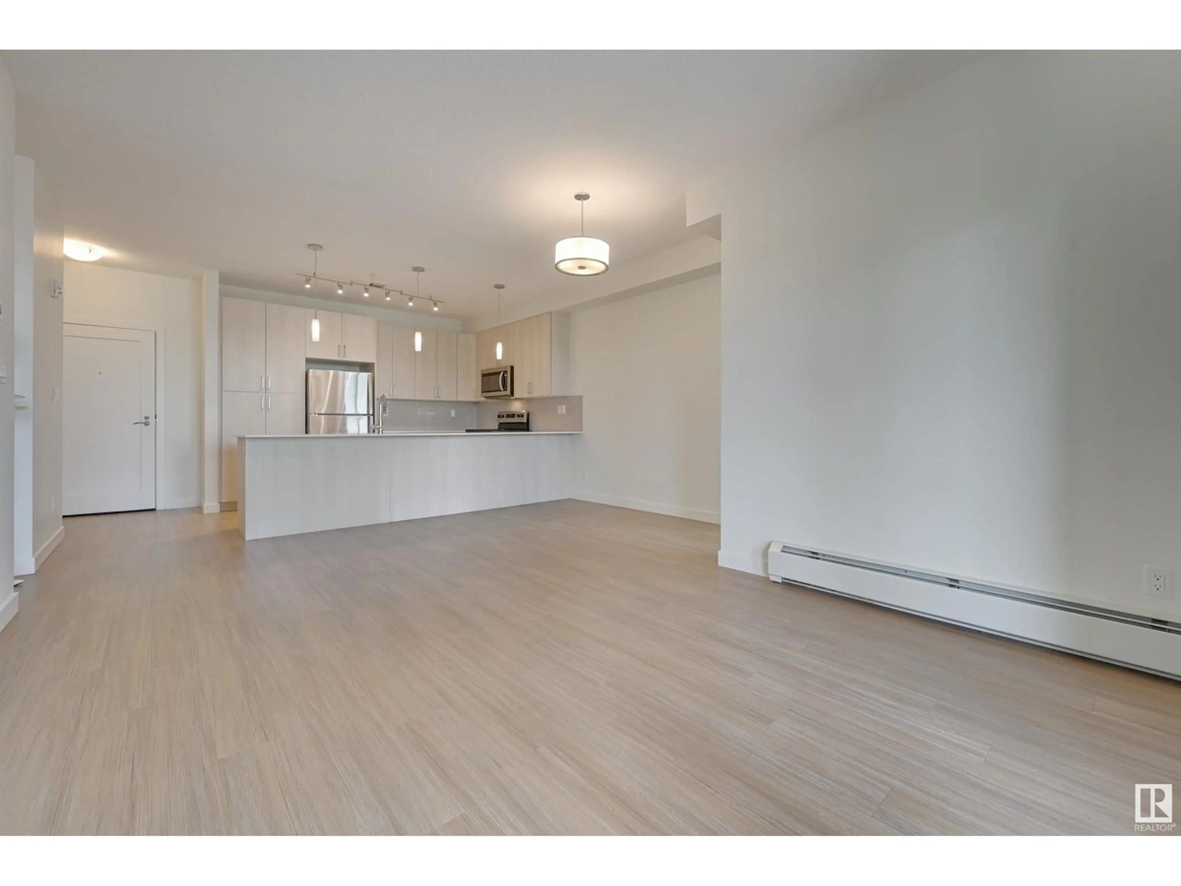 Open concept kitchen, wood/laminate floor for 17 - 308 COLUMBIA AV, Devon Alberta T9G1Y7