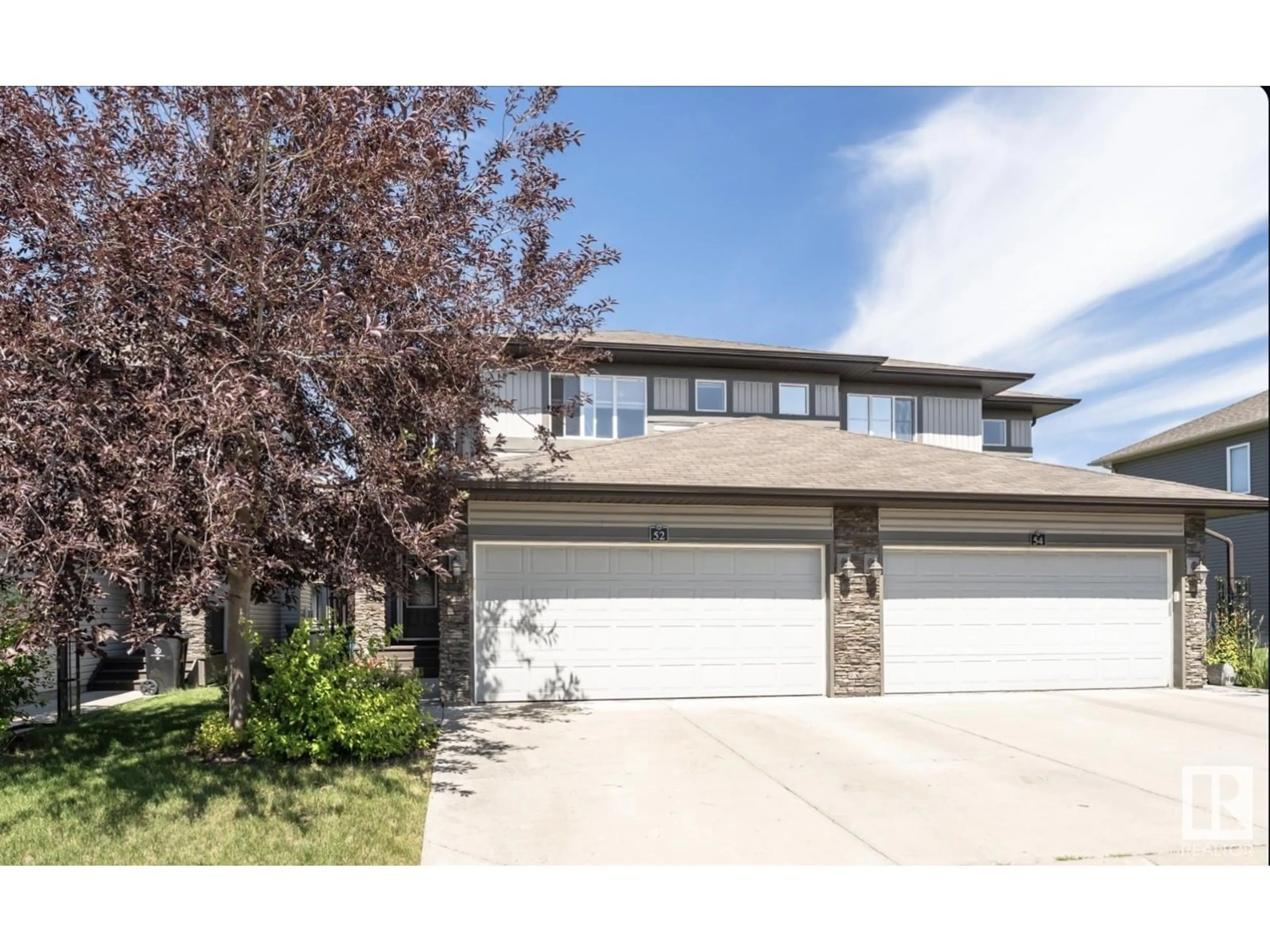 Home with vinyl exterior material, street for 8602 - 52 SOUTHFORT BV, Fort Saskatchewan Alberta T8L0J8