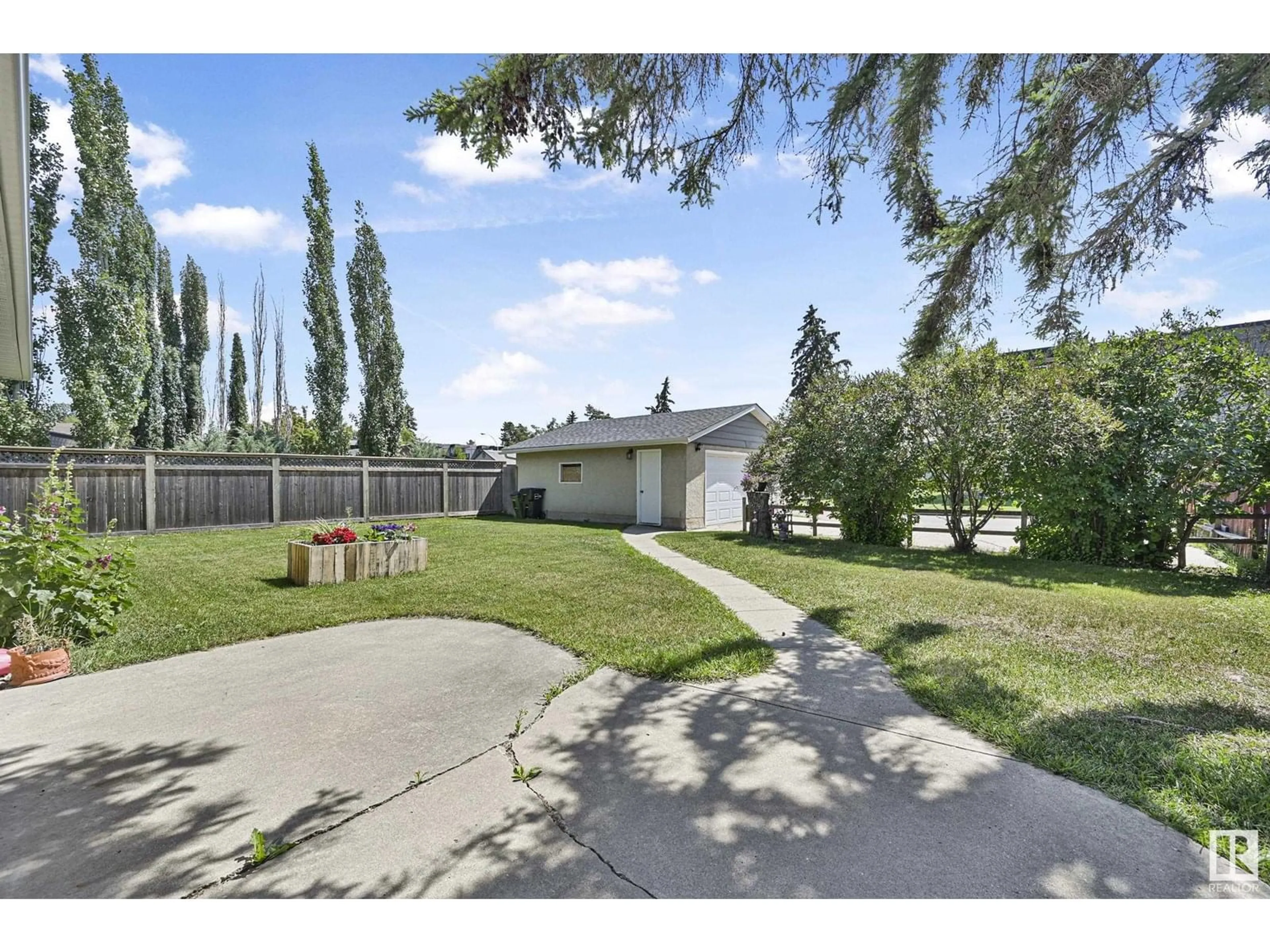 A pic from outside/outdoor area/front of a property/back of a property/a pic from drone, street for NW - 7111 150 AV, Edmonton Alberta T5C2X5