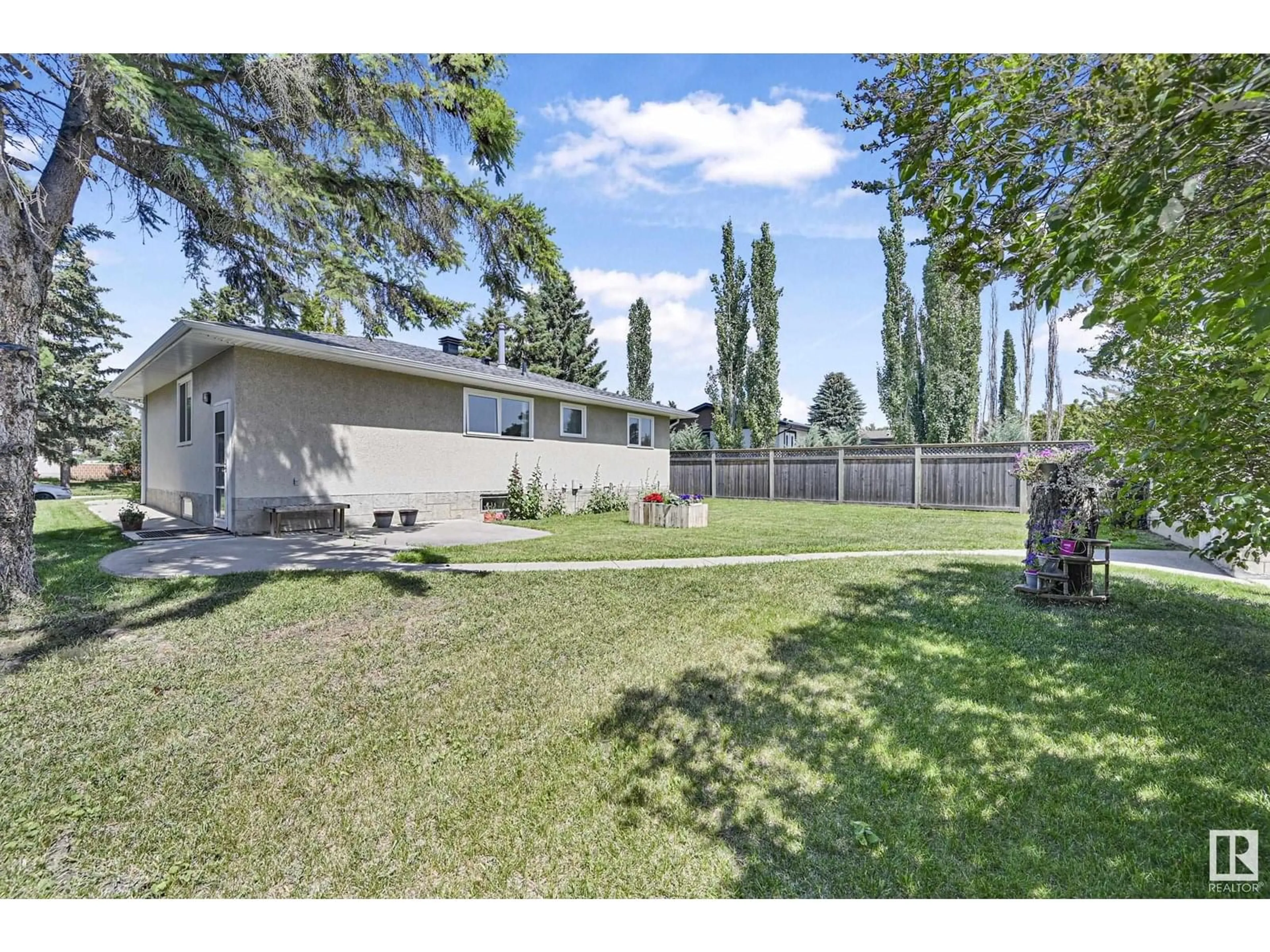 A pic from outside/outdoor area/front of a property/back of a property/a pic from drone, unknown for NW - 7111 150 AV, Edmonton Alberta T5C2X5