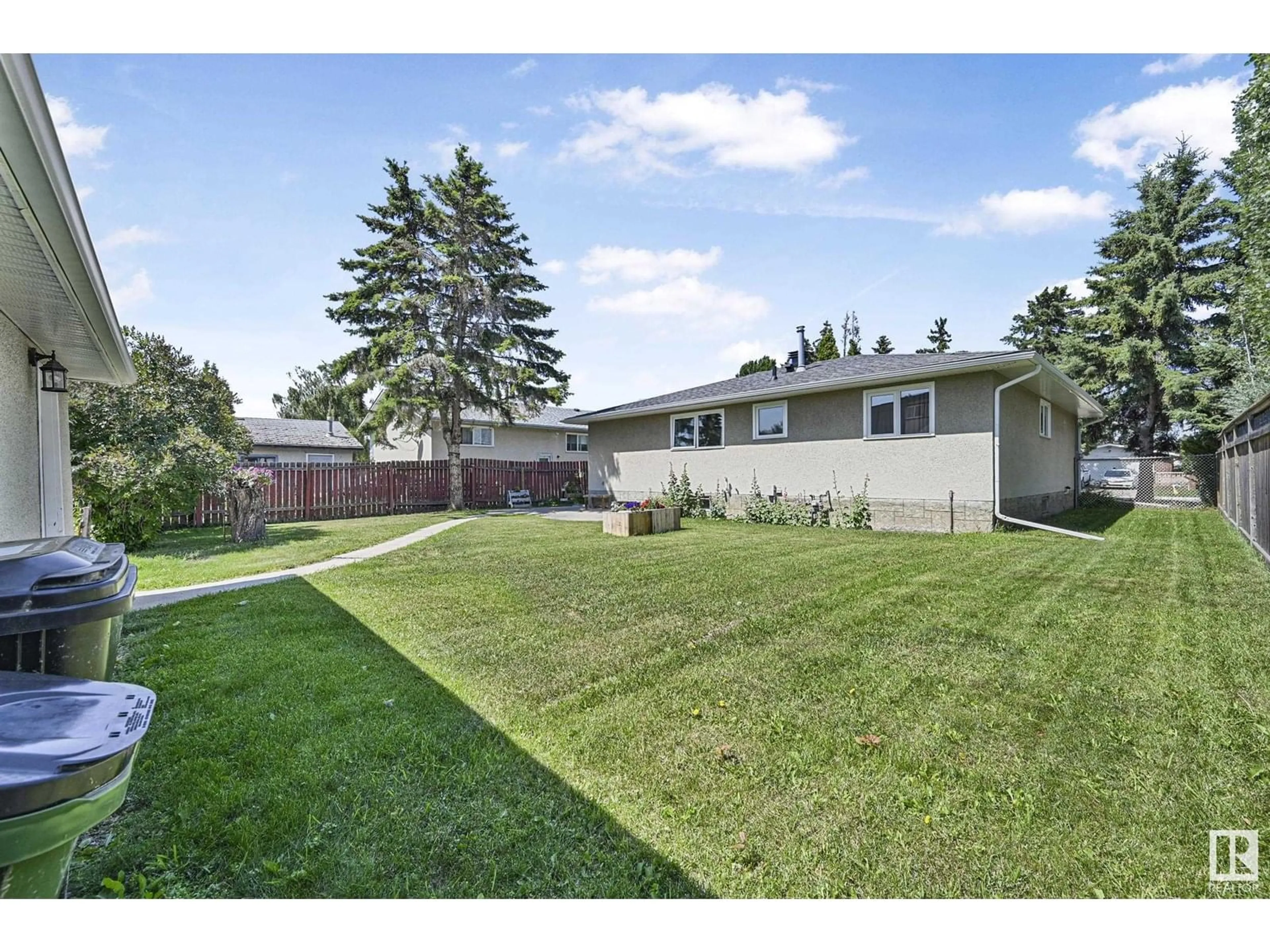 A pic from outside/outdoor area/front of a property/back of a property/a pic from drone, unknown for NW - 7111 150 AV, Edmonton Alberta T5C2X5