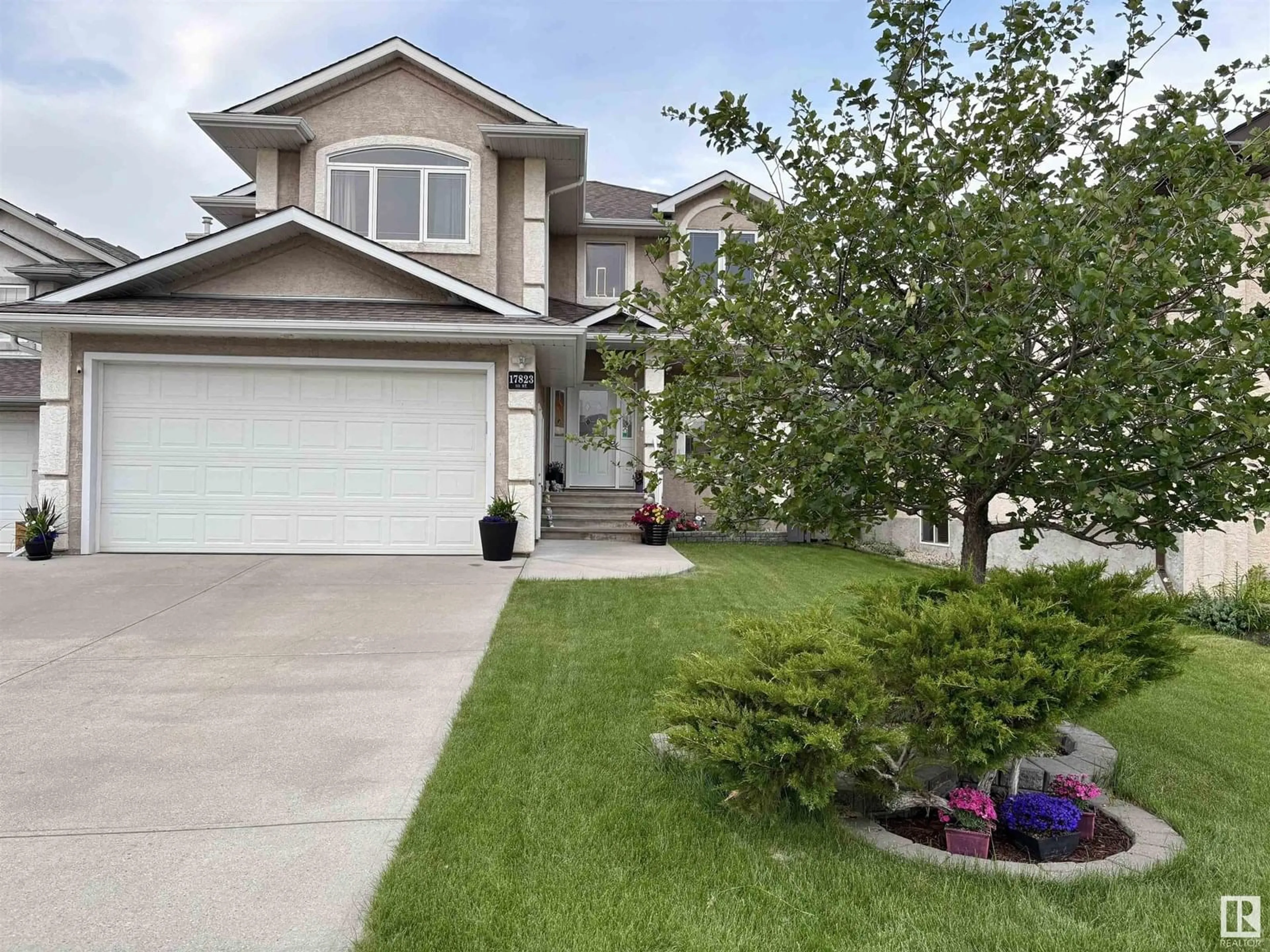 Home with vinyl exterior material, street for NW - 17823 111 ST, Edmonton Alberta T5X6J3