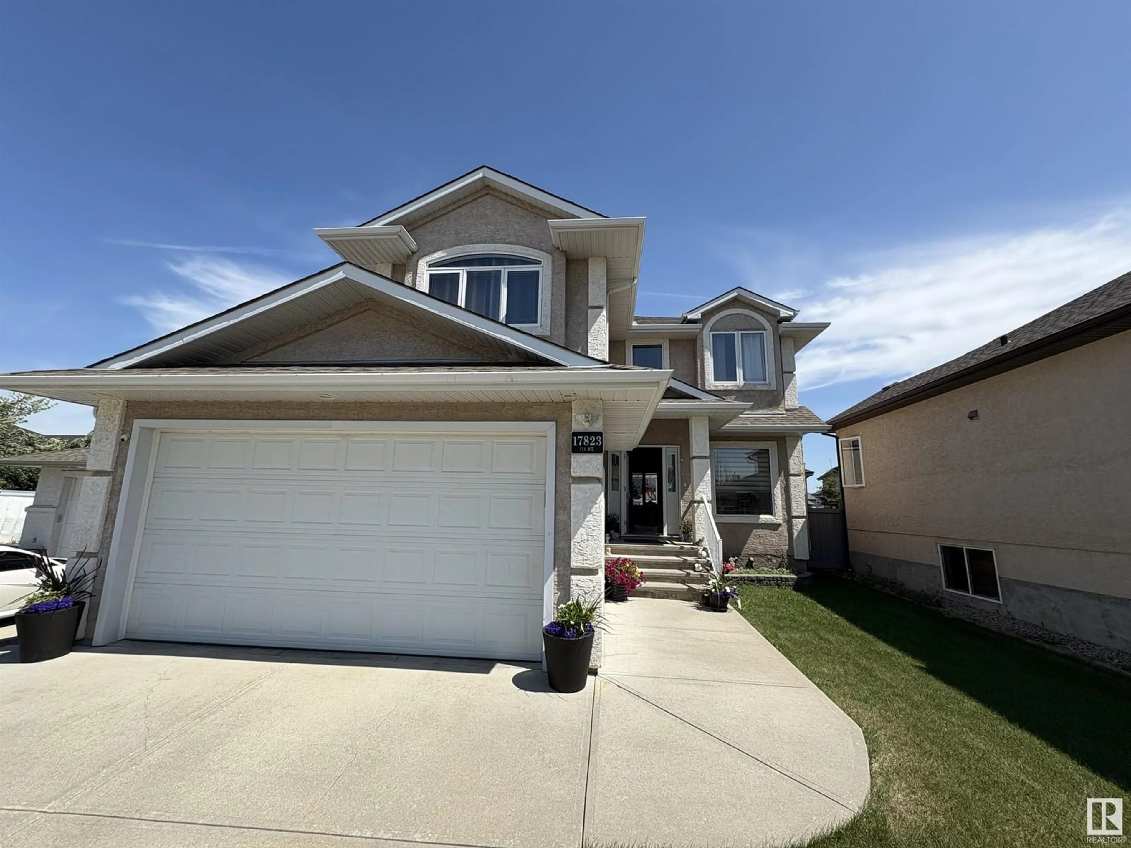 Home with vinyl exterior material, street for NW - 17823 111 ST, Edmonton Alberta T5X6J3