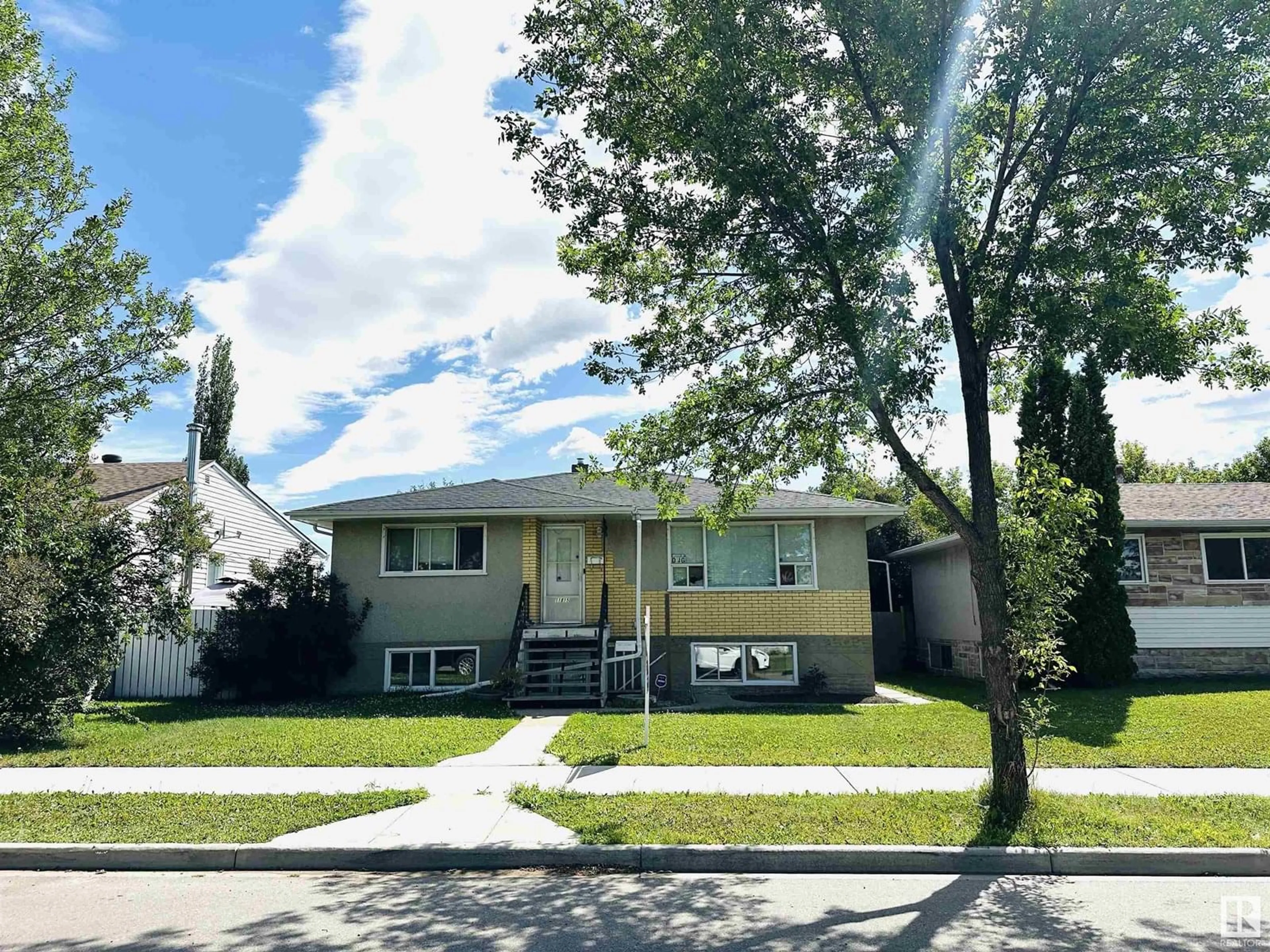 Home with vinyl exterior material, street for 11815 122 ST, Edmonton Alberta T5L0C3