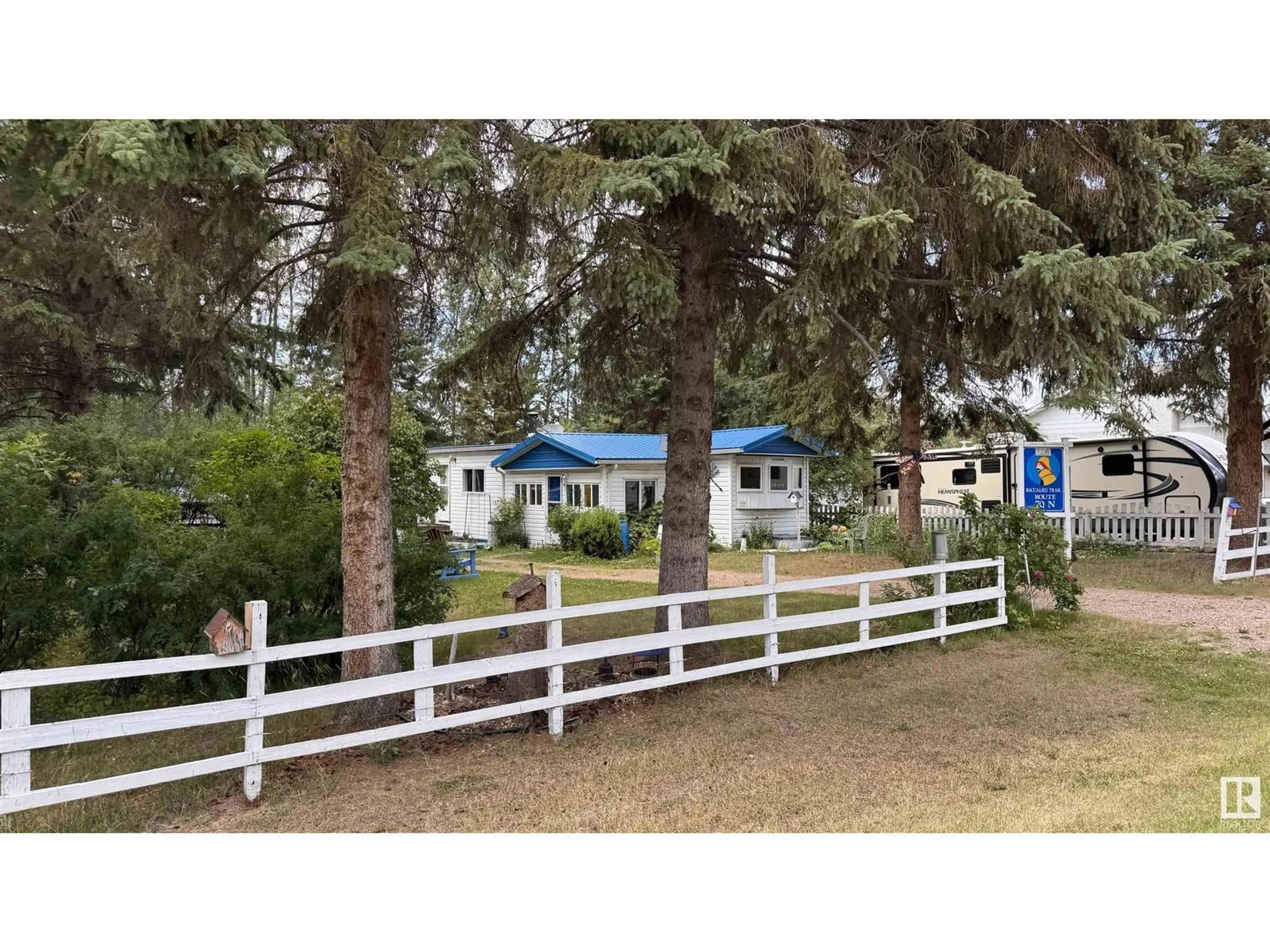 A pic from outside/outdoor area/front of a property/back of a property/a pic from drone, mountain view for 314 11121 TWP RD 595, Rural St. Paul County Alberta T0A0C0