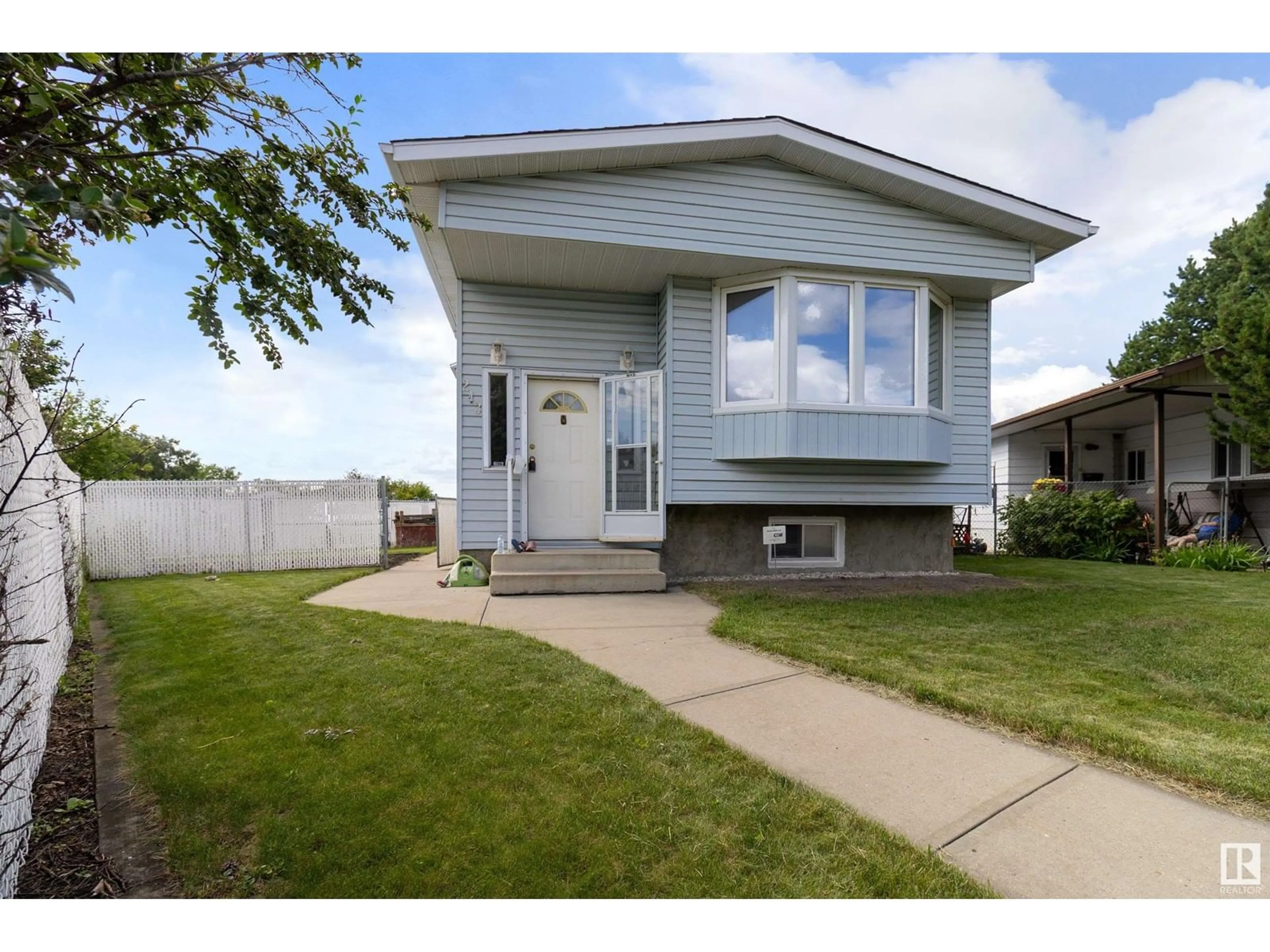 Home with vinyl exterior material, street for 243 LEE RIDGE RD, Edmonton Alberta T6K0N2