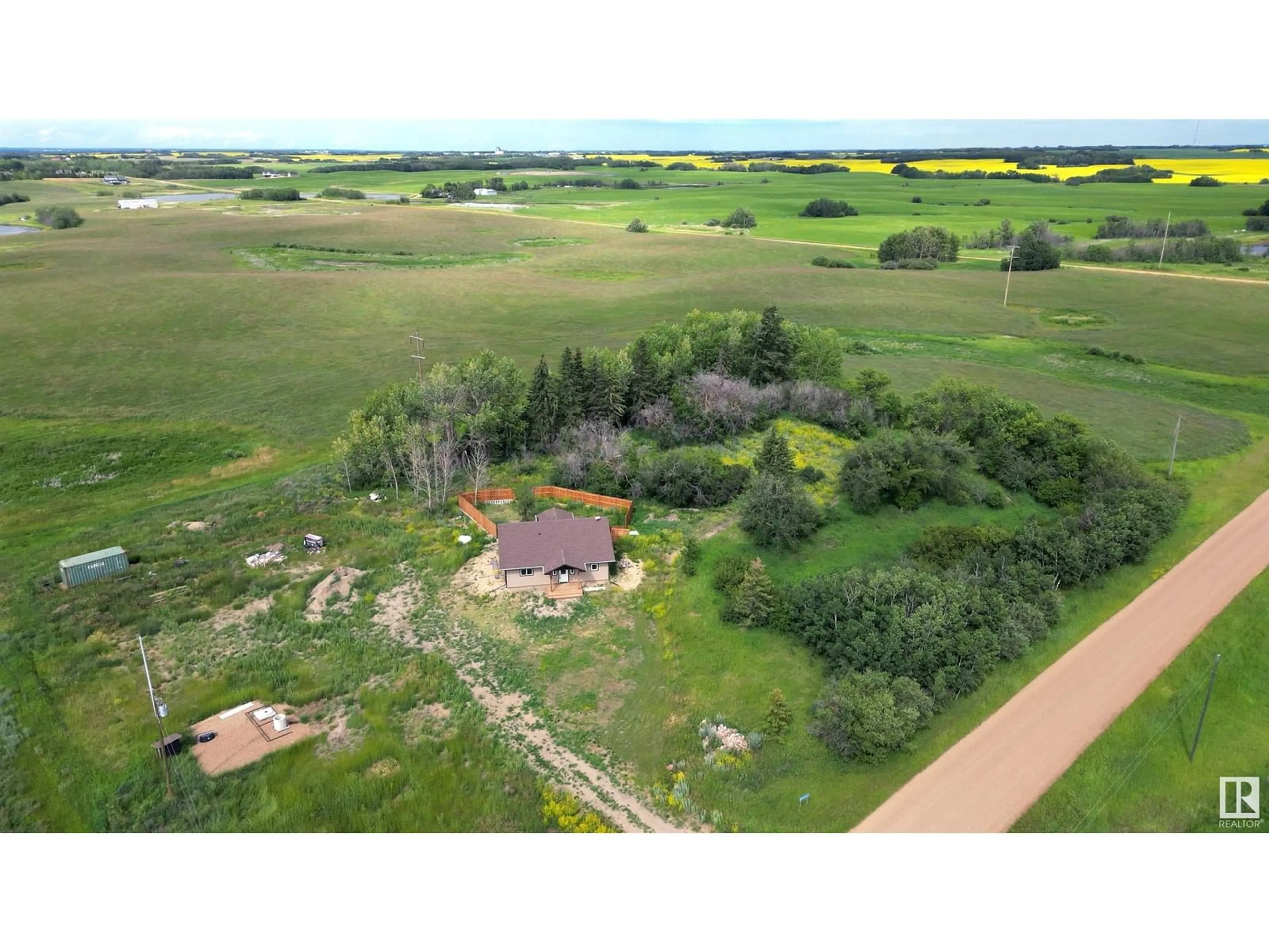 A pic from outside/outdoor area/front of a property/back of a property/a pic from drone, unknown for 21318 TWP 464, Rural Camrose County Alberta T0C0L0