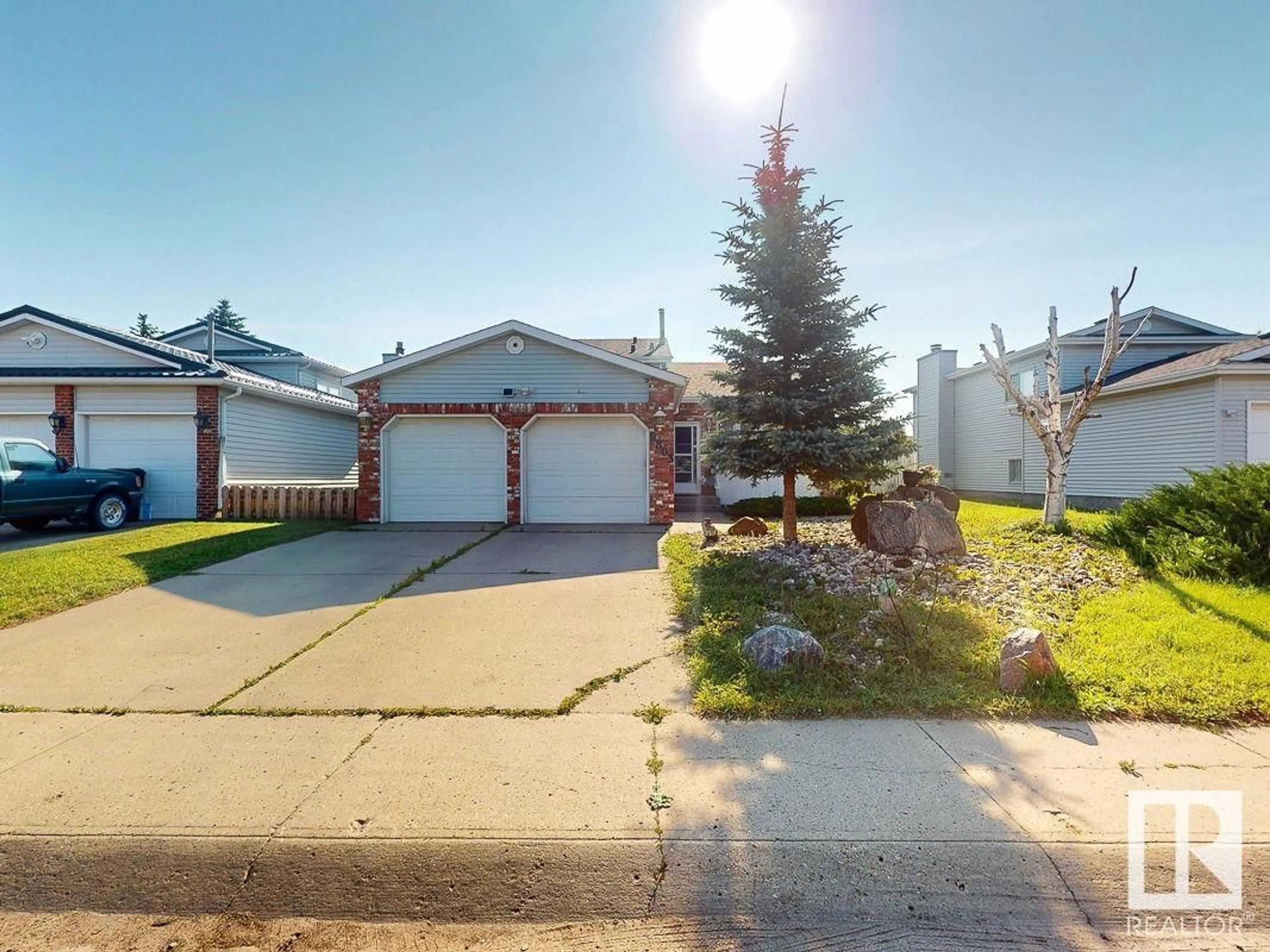 A pic from outside/outdoor area/front of a property/back of a property/a pic from drone, street for 9803 185 NW, Edmonton Alberta T5T3L7
