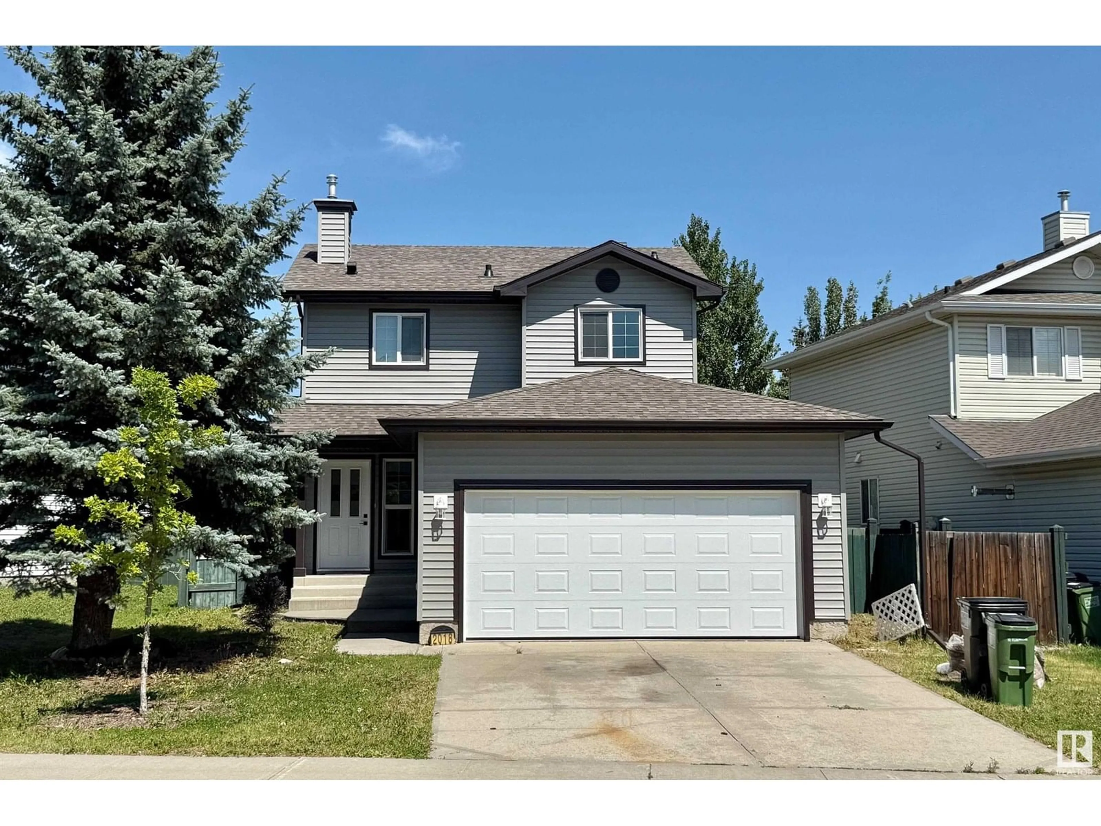 Home with vinyl exterior material, street for 2018 GARNETT WY, Edmonton Alberta T5T6R1