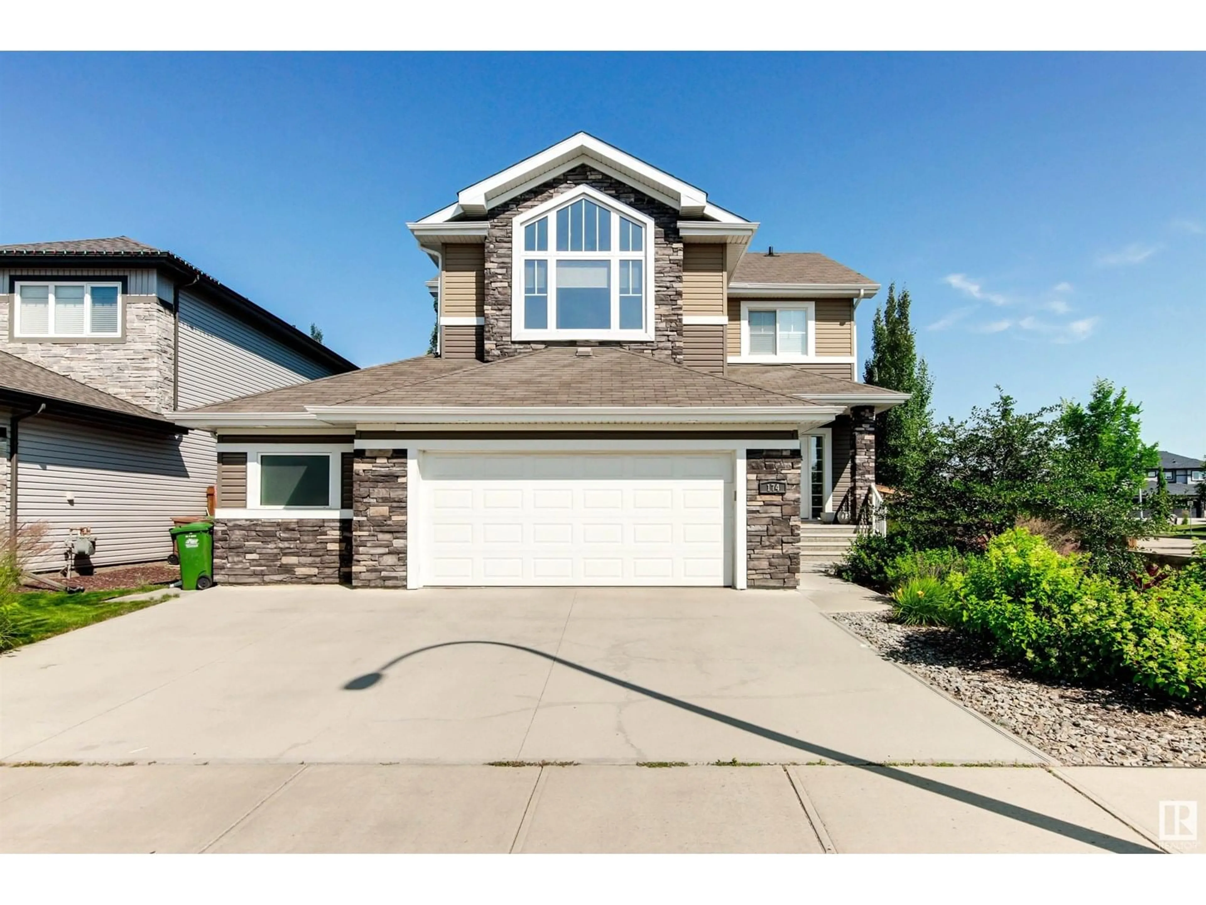 Home with vinyl exterior material, street for 174 NORTH RIDGE DR, St. Albert Alberta T8N4C1