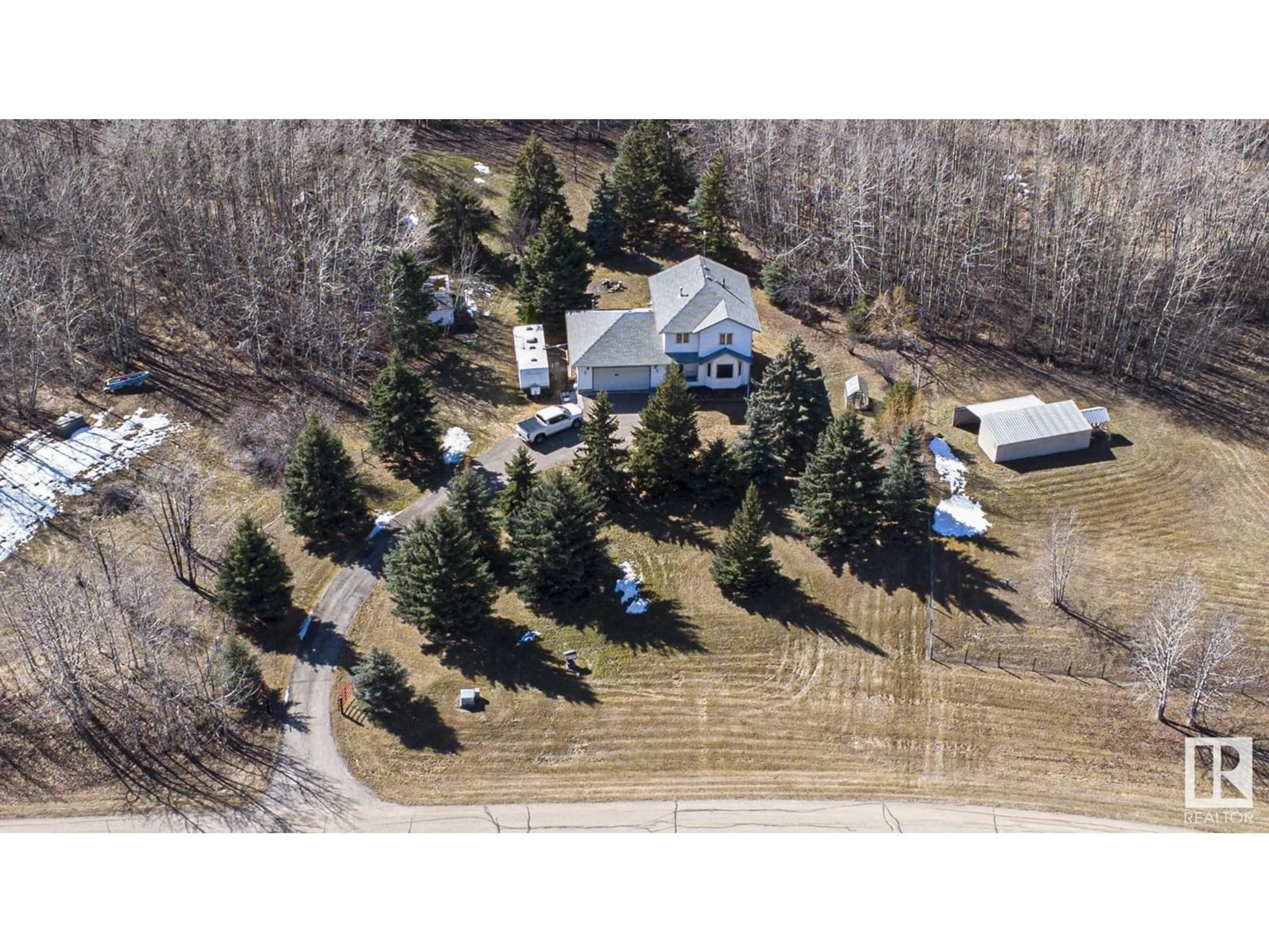 A pic from outside/outdoor area/front of a property/back of a property/a pic from drone, street for 52306 - 181 RGE ROAD 212 RGE ROAD, Rural Strathcona County Alberta T8G1A9