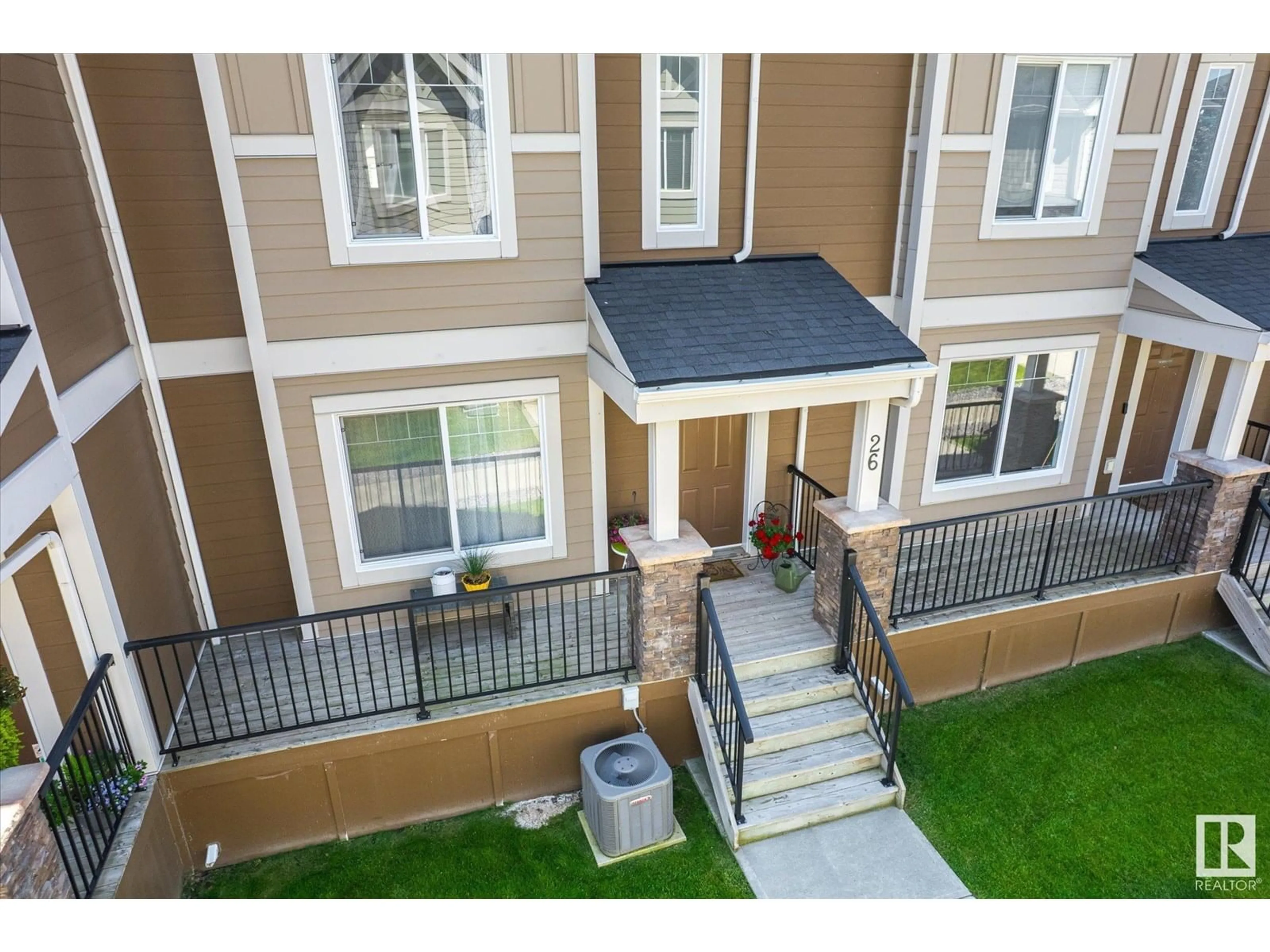 A pic from outside/outdoor area/front of a property/back of a property/a pic from drone, unknown for 26 - 1150 WINDERMERE WY, Edmonton Alberta T6W2B6
