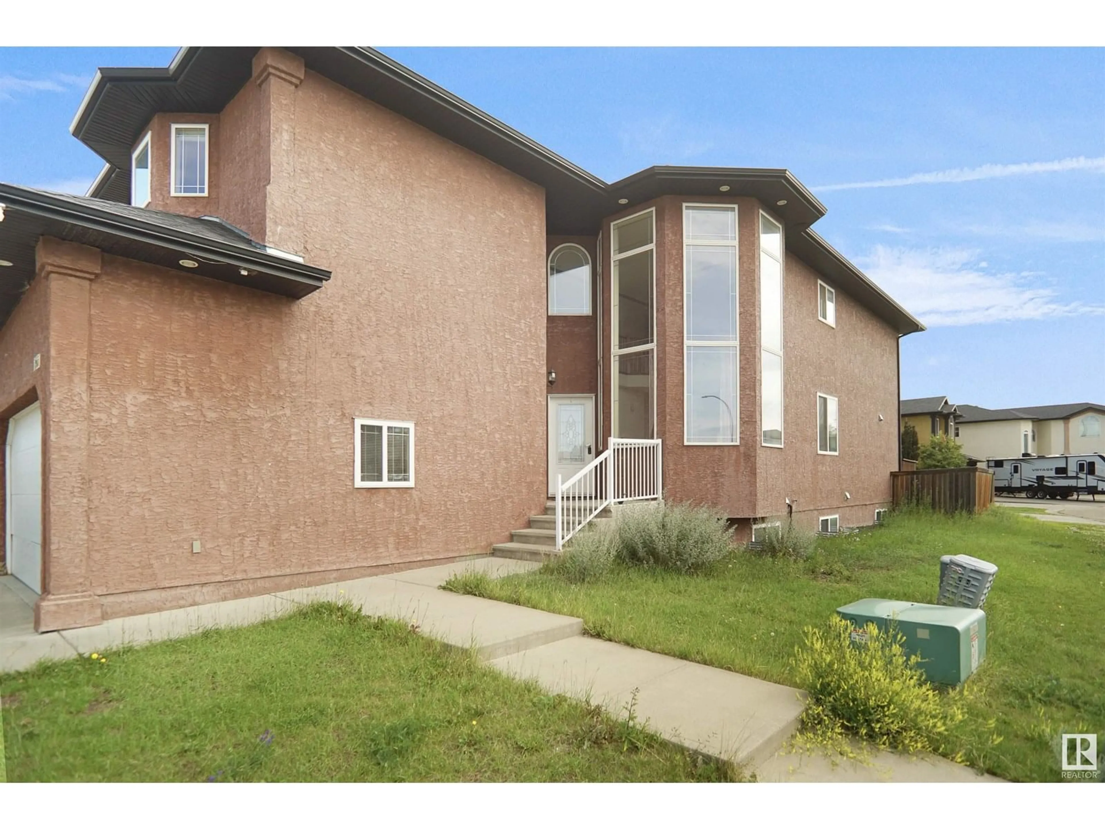 Home with brick exterior material, building for 16221 54A ST NW, Edmonton Alberta T5Y0E9