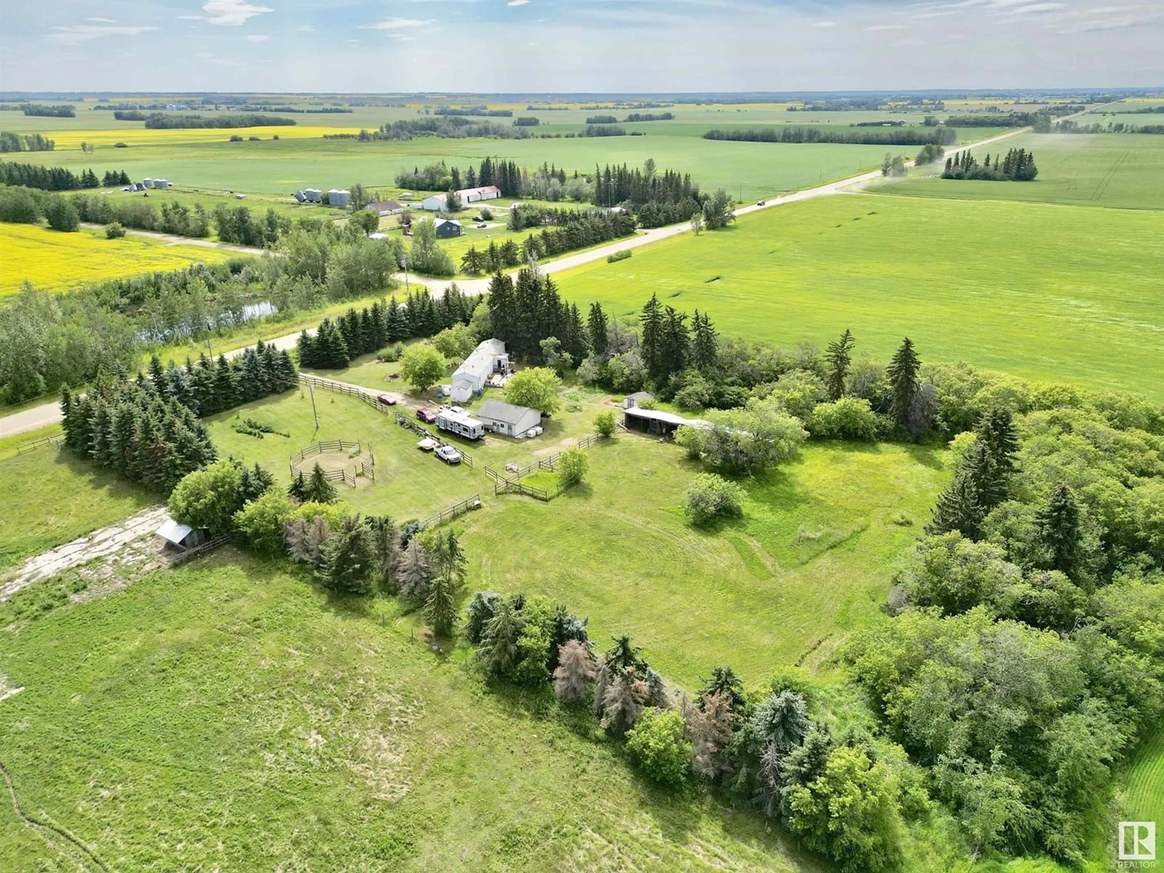A pic from outside/outdoor area/front of a property/back of a property/a pic from drone, unknown for 24326 TWP ROAD 590, Rural Westlock County Alberta T0G2L0