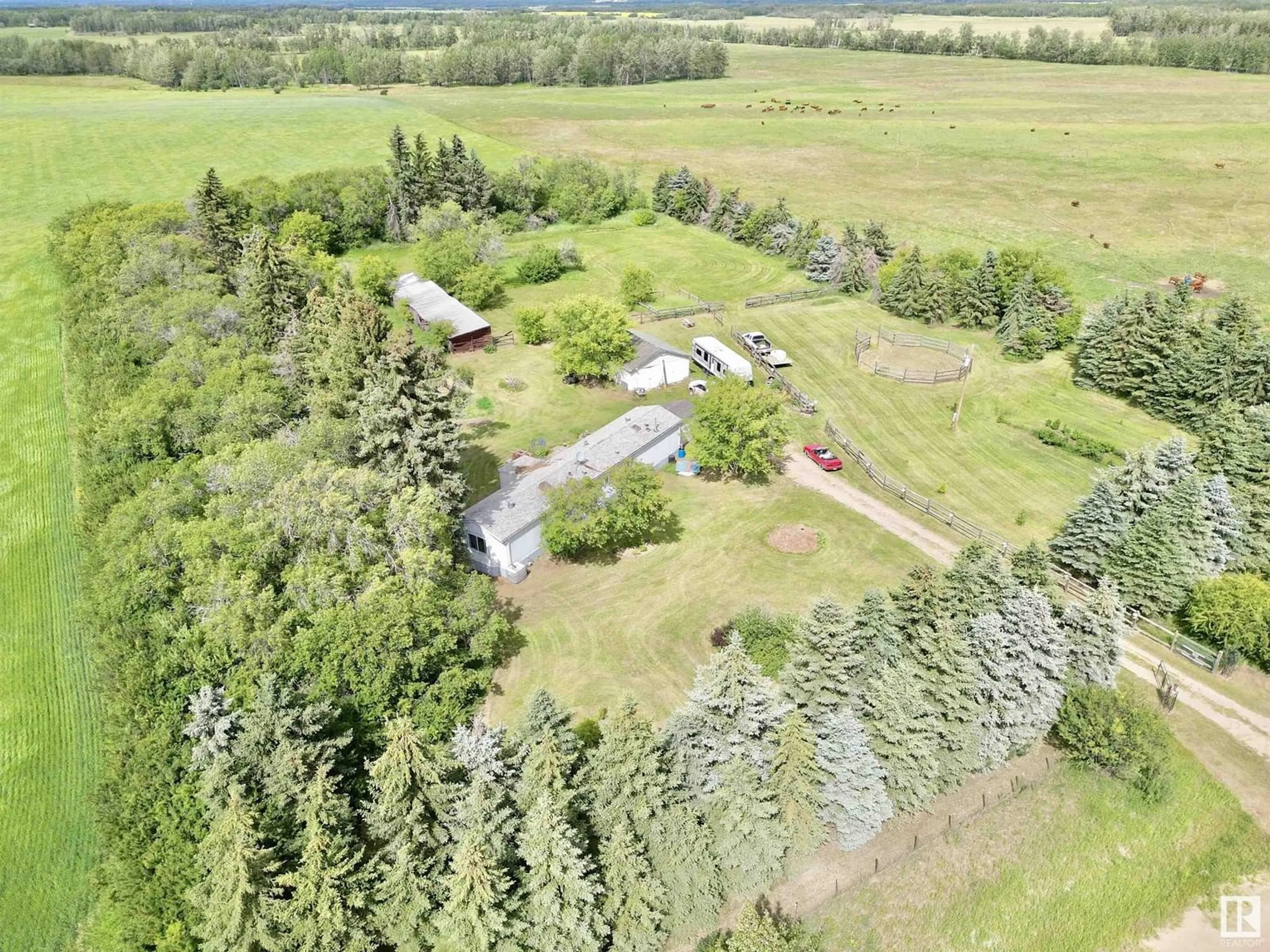 A pic from outside/outdoor area/front of a property/back of a property/a pic from drone, forest/trees view for 24326 TWP ROAD 590, Rural Westlock County Alberta T0G2L0