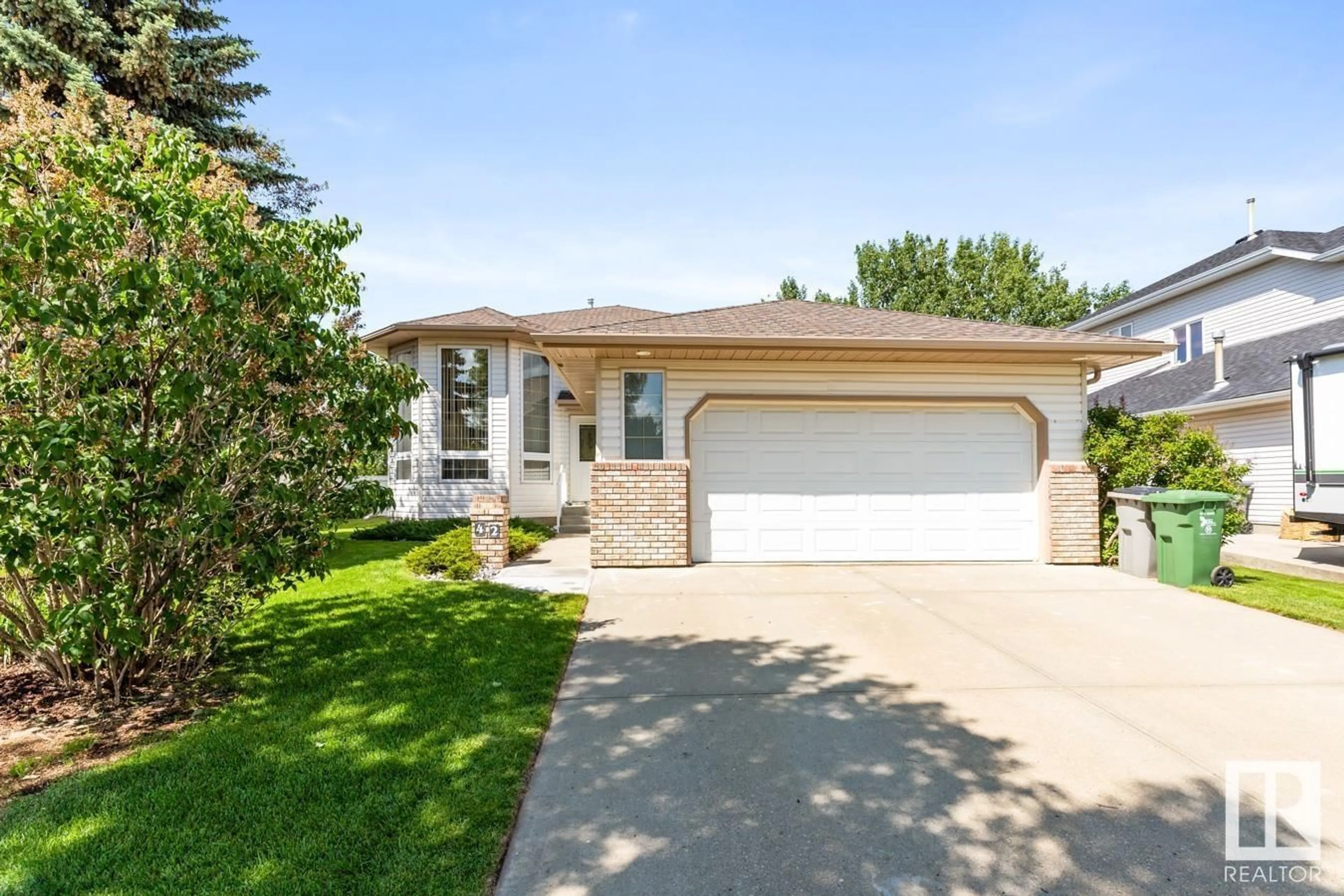 Home with vinyl exterior material, street for 42 COLONIALE WY, Beaumont Alberta T4X1M2