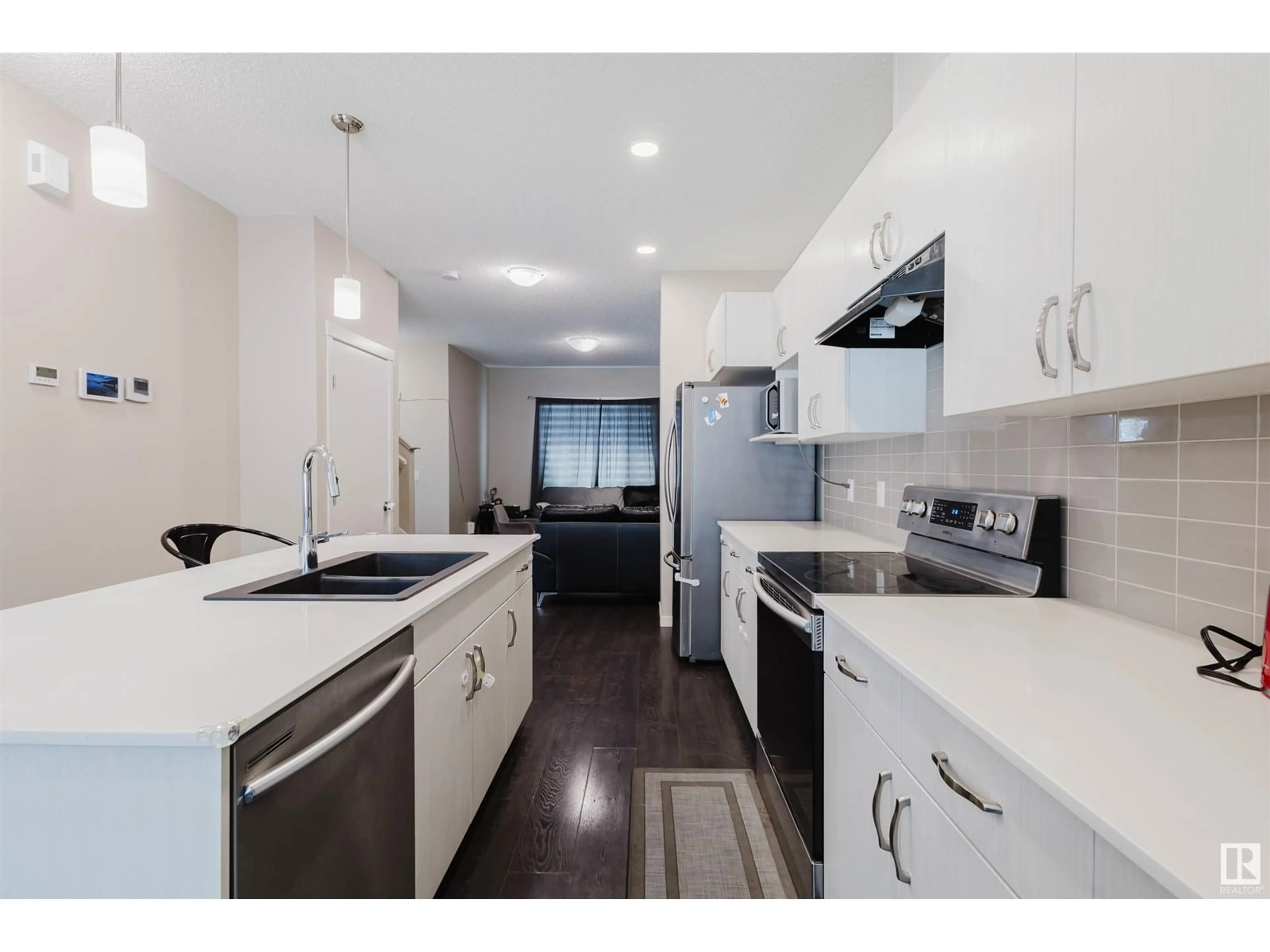 Open concept kitchen, unknown for 593 EBBERS WY, Edmonton Alberta T5Y1R8