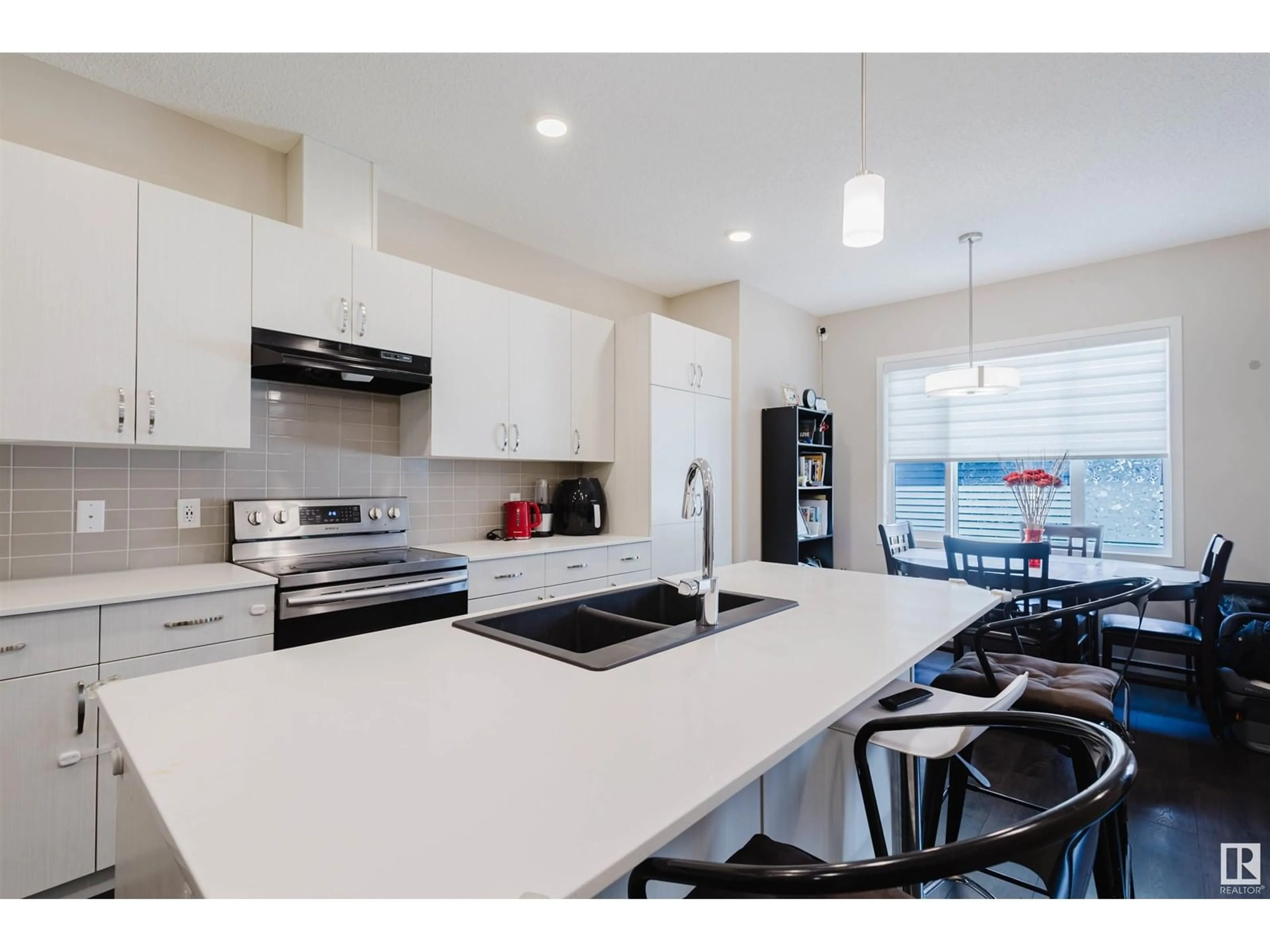 Open concept kitchen, ceramic/tile floor for 593 EBBERS WY, Edmonton Alberta T5Y1R8