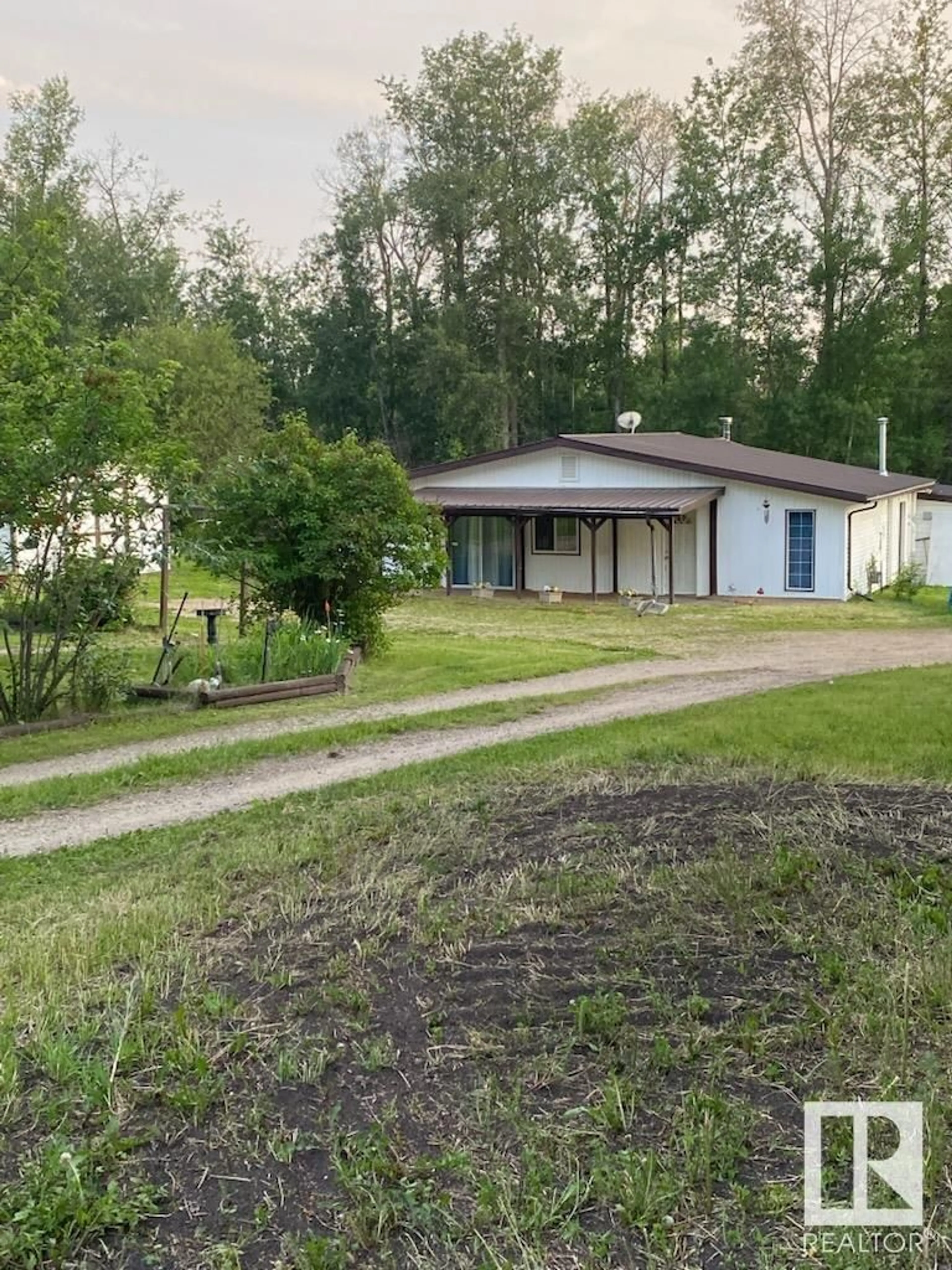 A pic from outside/outdoor area/front of a property/back of a property/a pic from drone, street for 63303 - 174 HWY 867, Rural Lac La Biche County Alberta T0A2C0