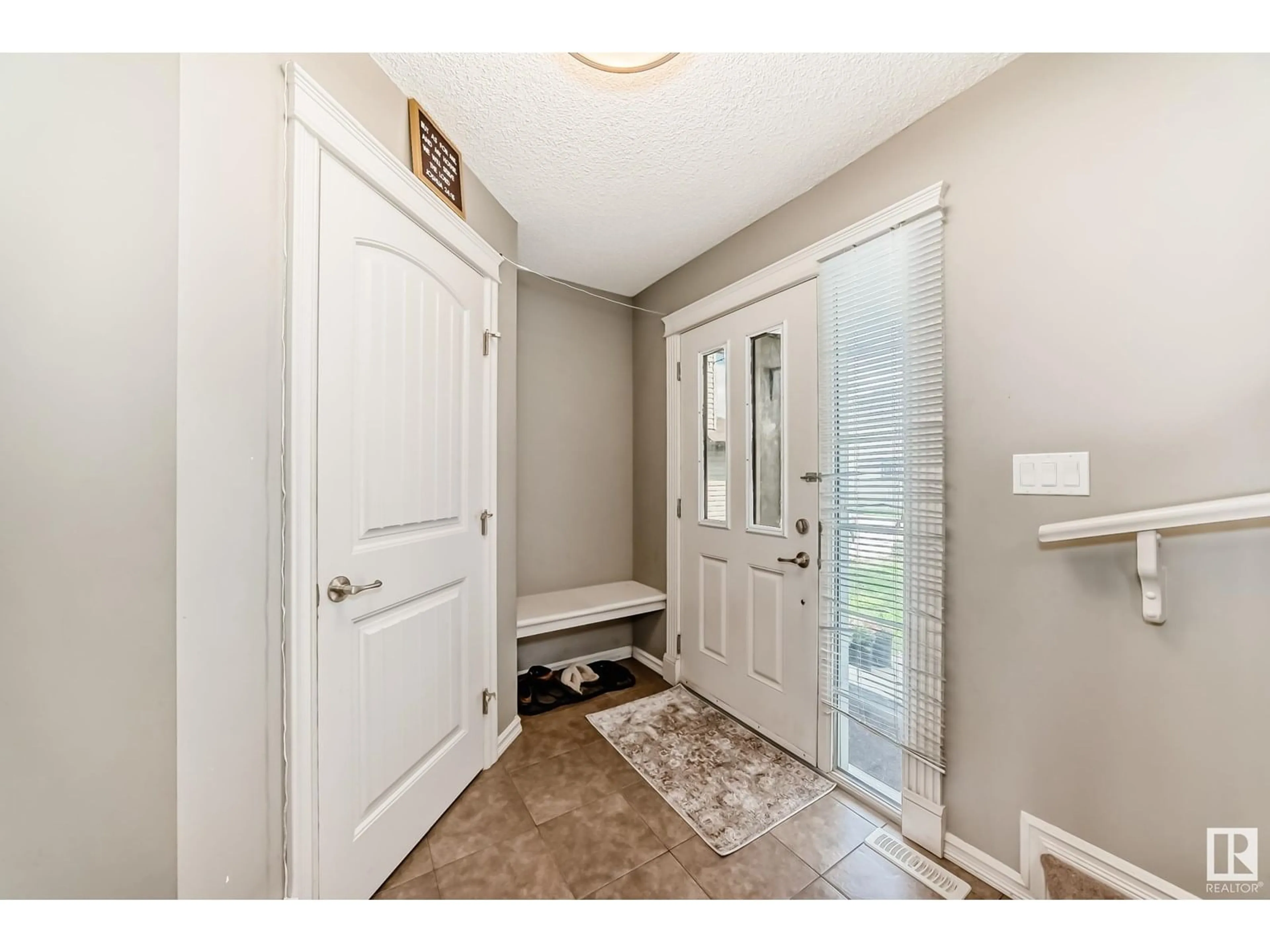 Indoor entryway for 3320 20 AV, Edmonton Alberta T6T0L4