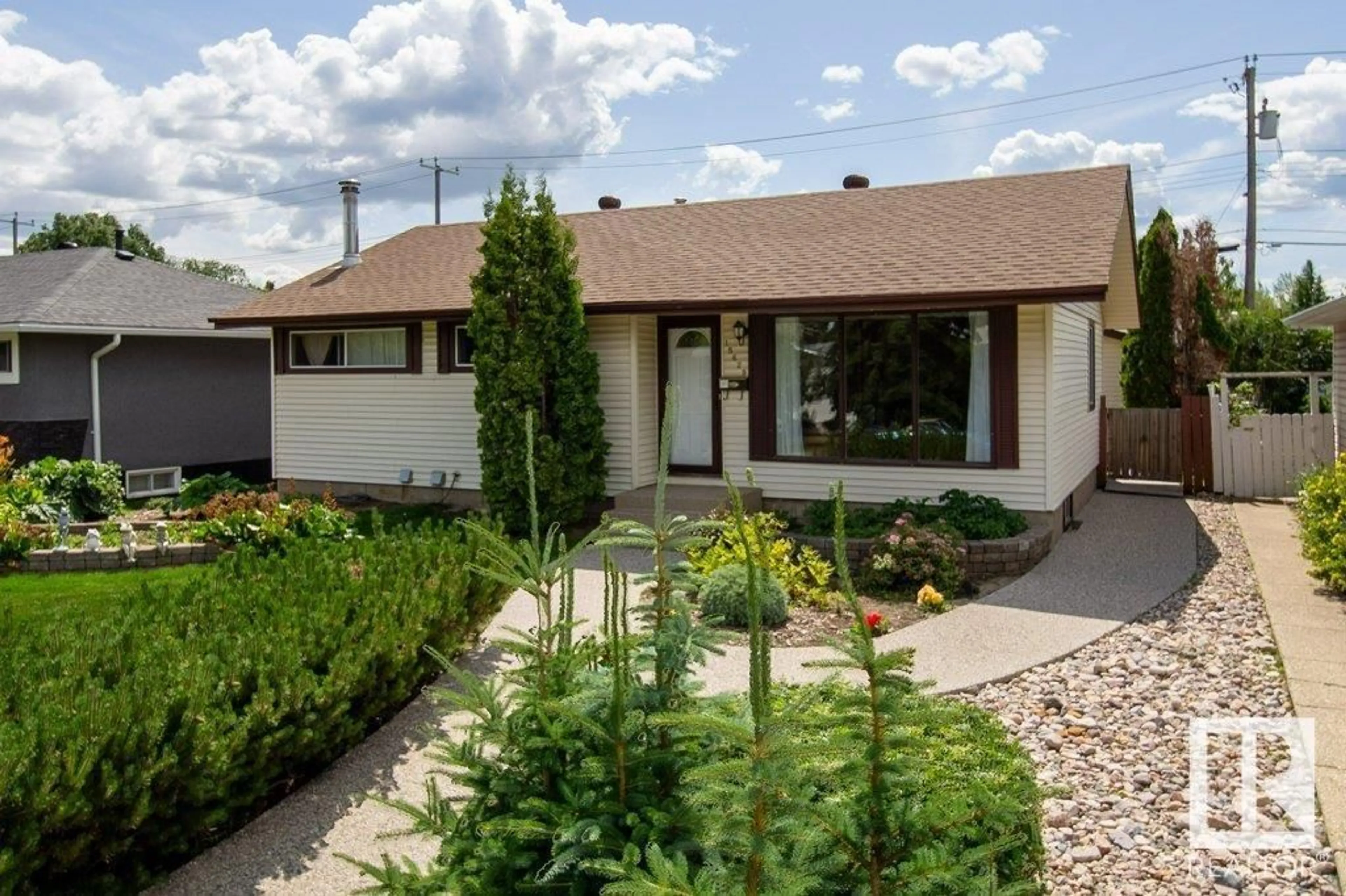 Home with vinyl exterior material, street for NW - 15629 83 AV, Edmonton Alberta T5R3T6